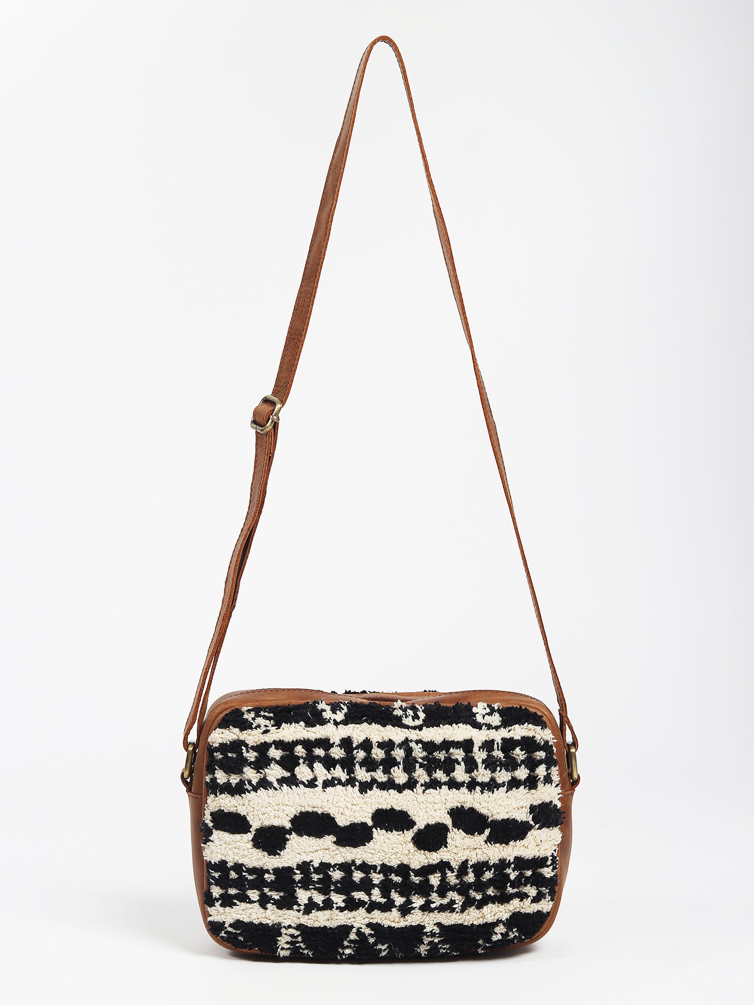 Archer sling bag on model — Art Avenue