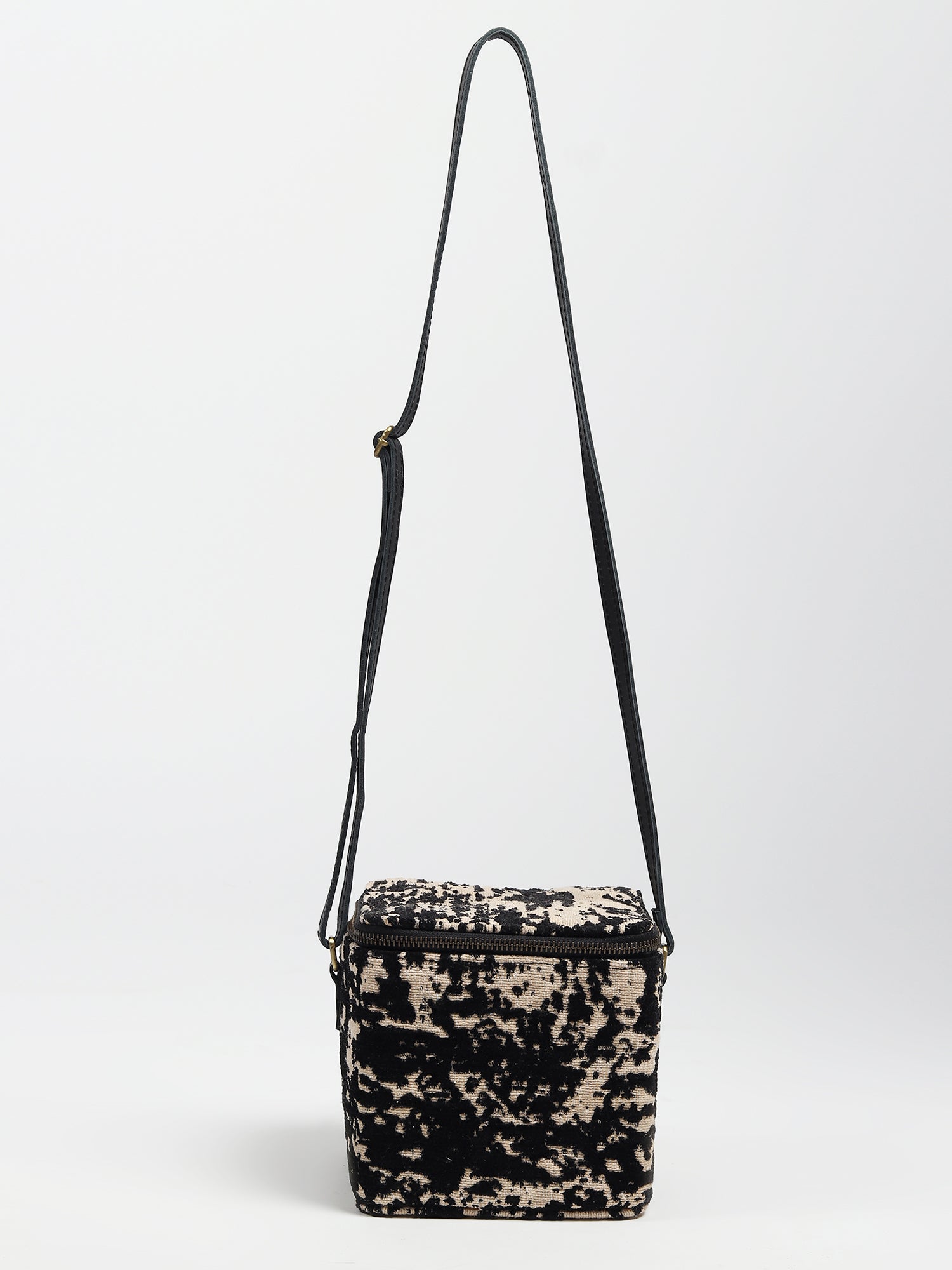 Alira leather and jacquard sling bag — Art Avenue