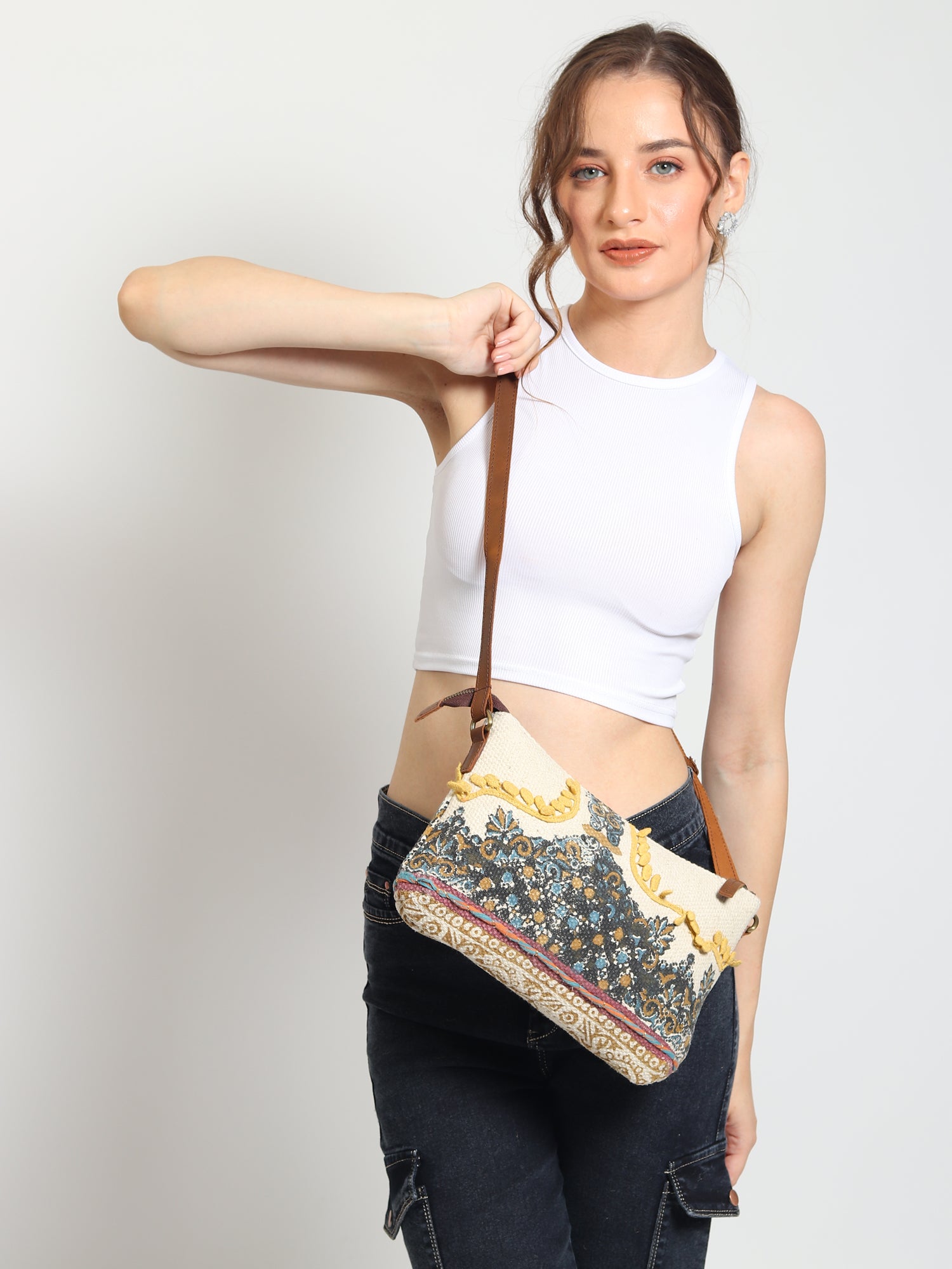 Danian block-printed and leather sling bag closure detail — Art Avenue