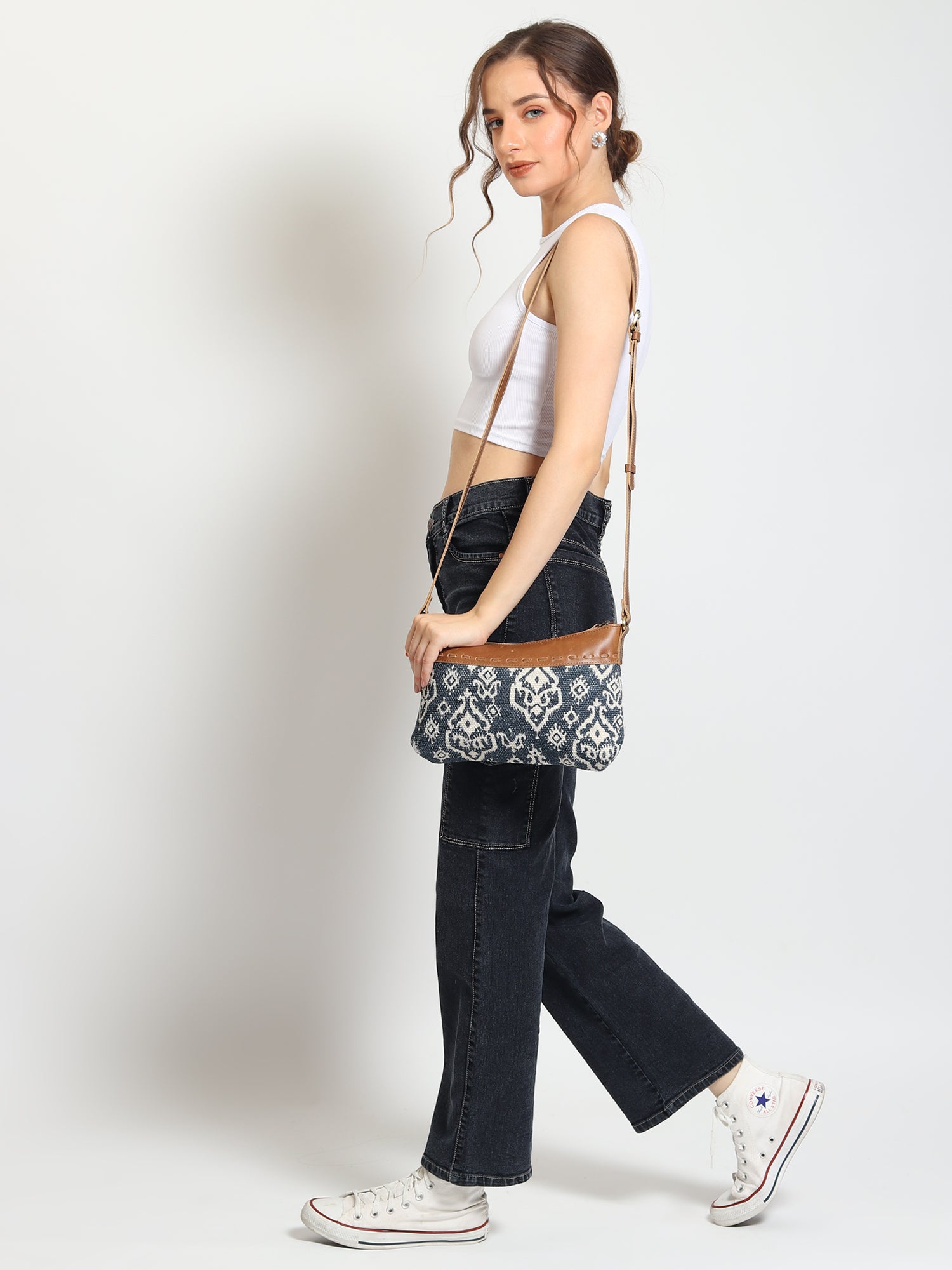 Ava leather and printed fabric sling bag closure detail — Art Avenue