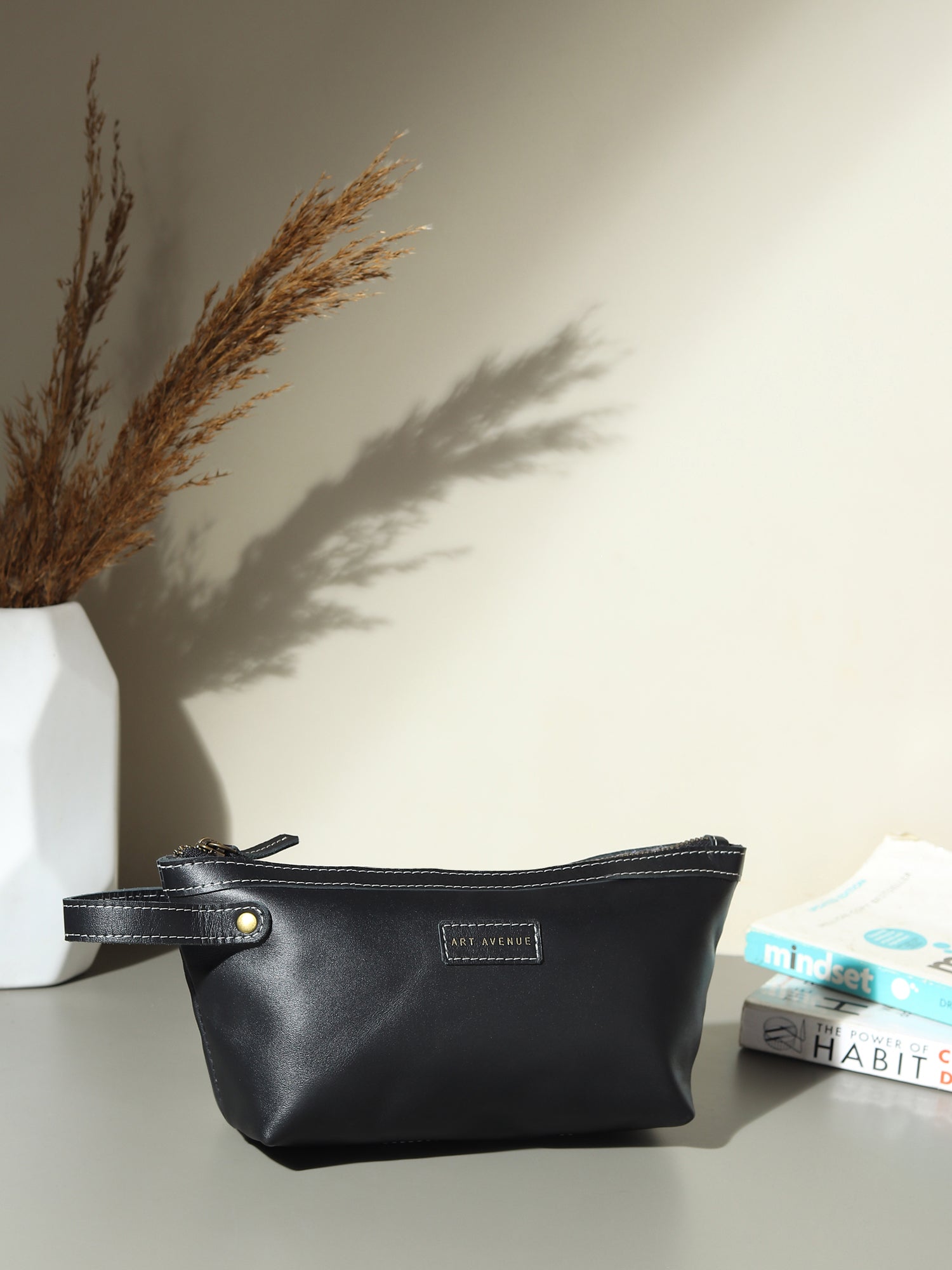 Flisk leather pouch on model — Art Avenue