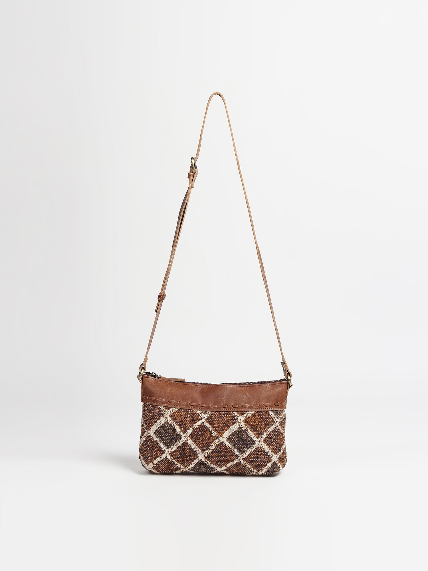 Allambee leather and printed fabric sling bag — Art Avenue