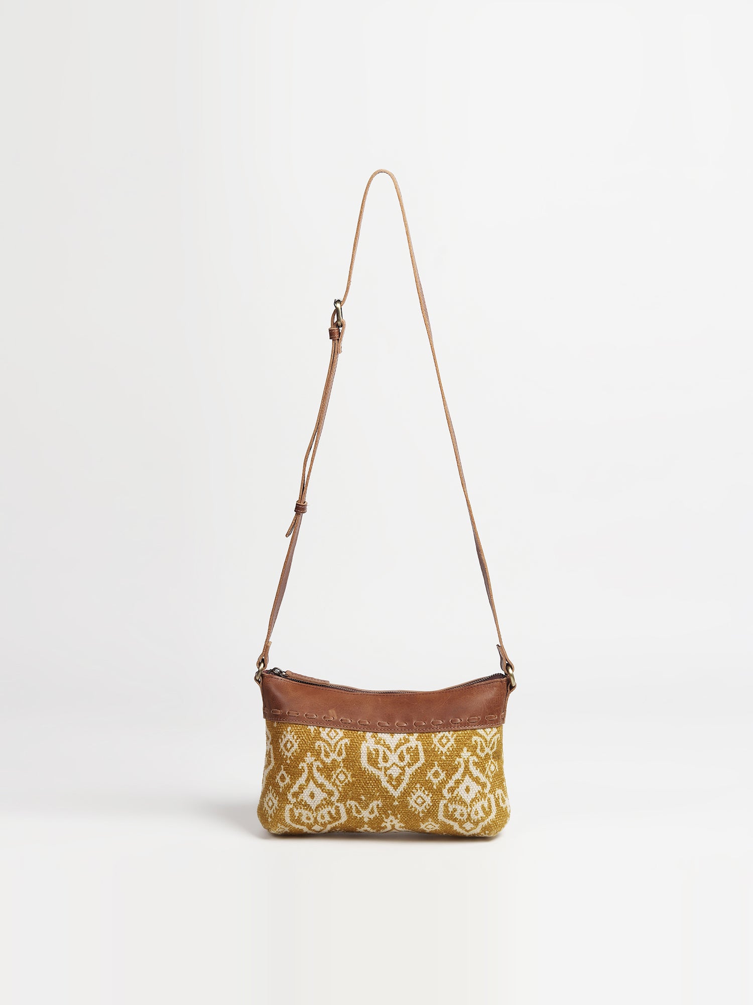 Ayla leather and printed fabric sling bag — Art Avenue