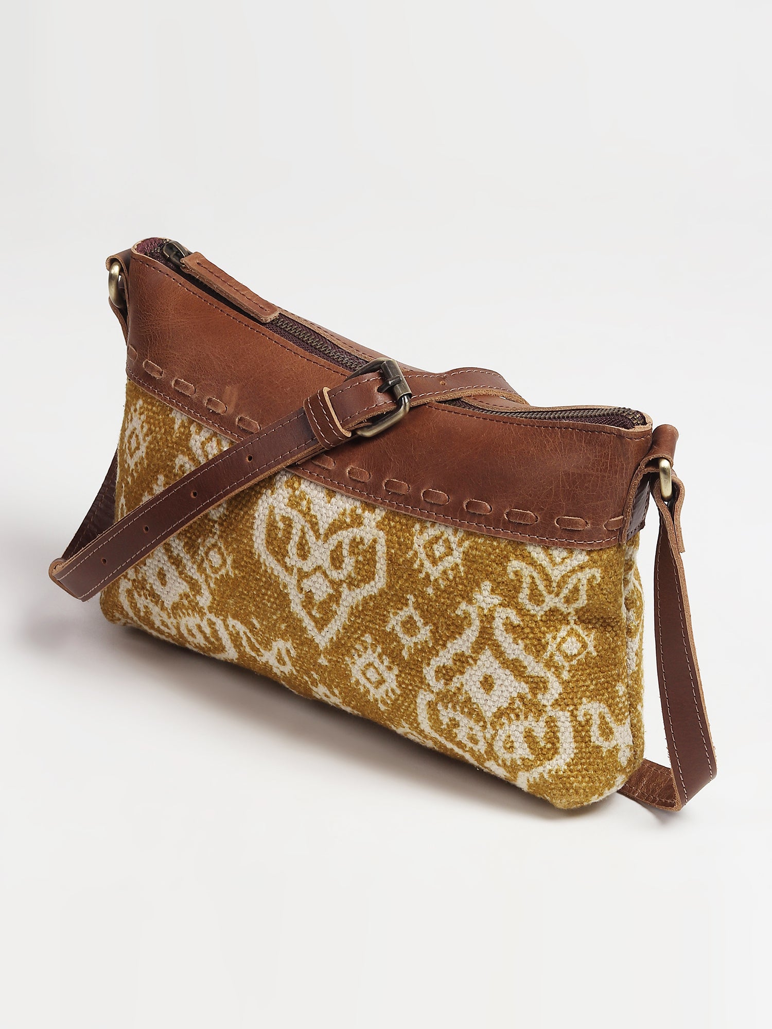 Ayla leather sling bag, side view — Art Avenue