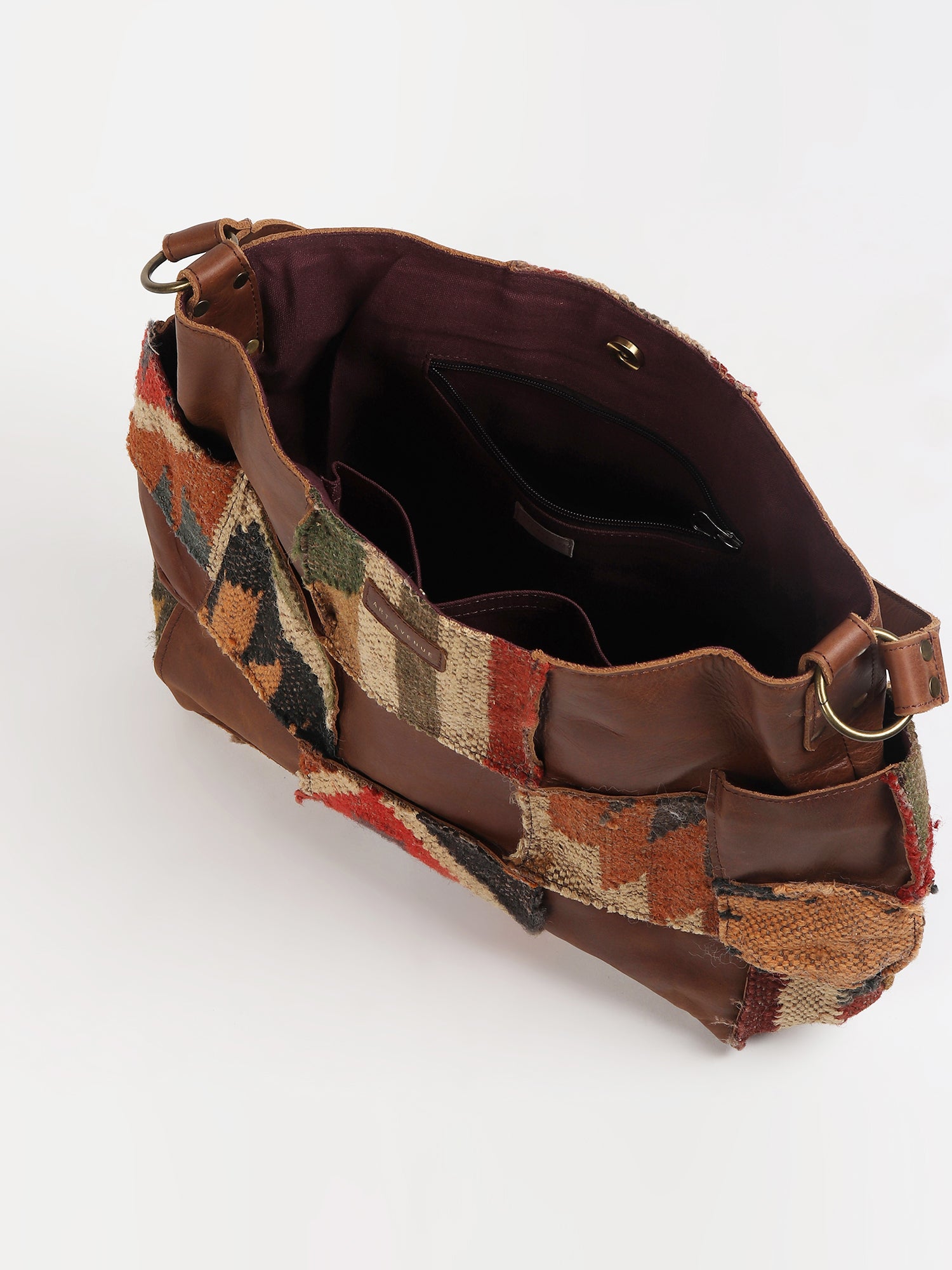 Behoove patchwork handbag closure detail — Art Avenue