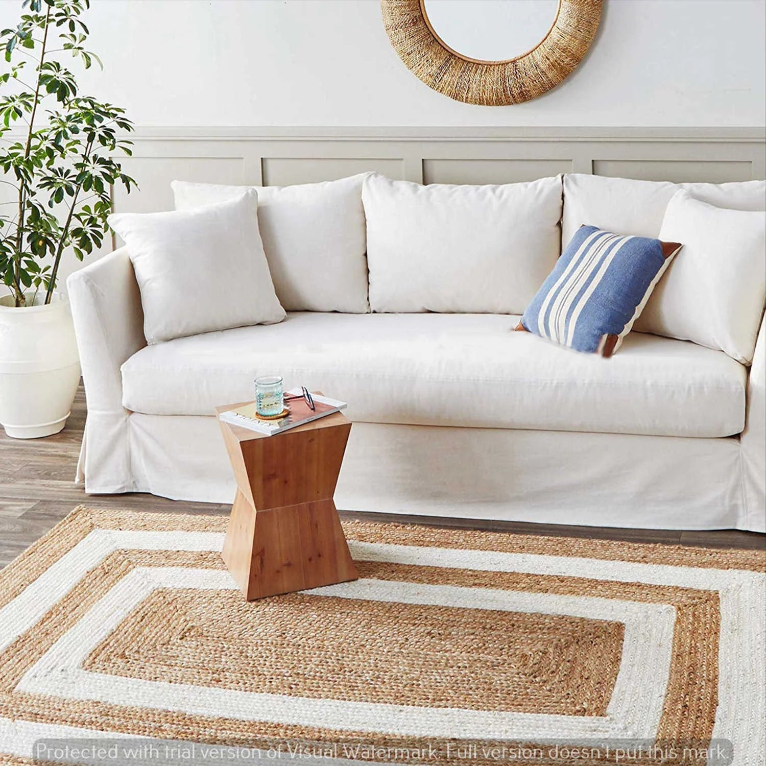 Kabila braided jute rug room setting — Art Avenue