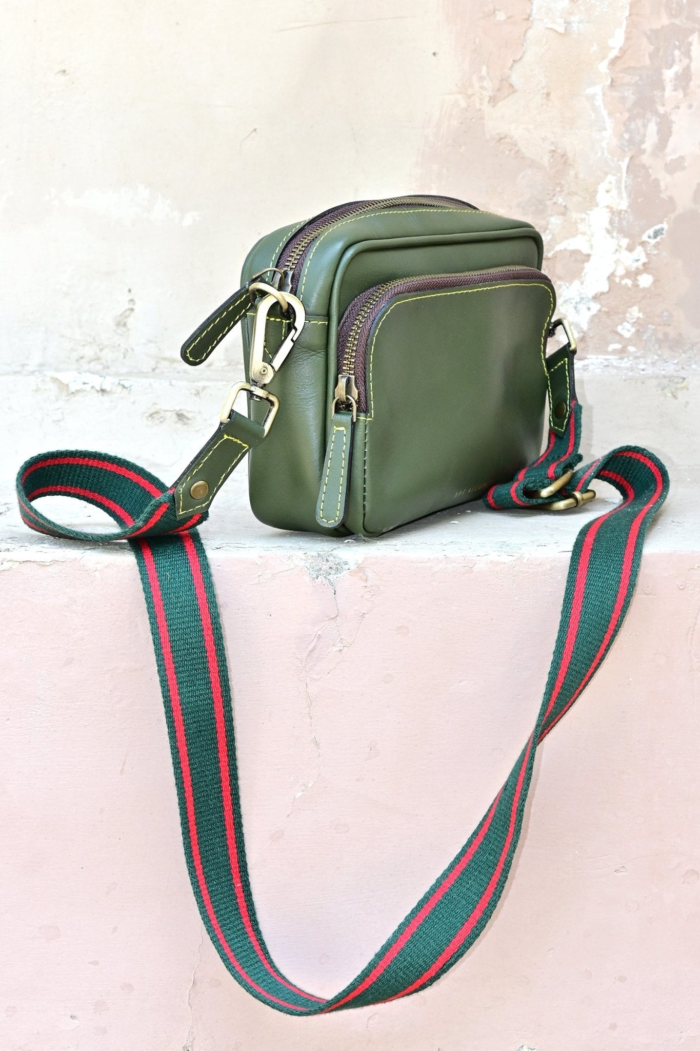 Harisson leather sling bag in green, second view — Art Avenue
