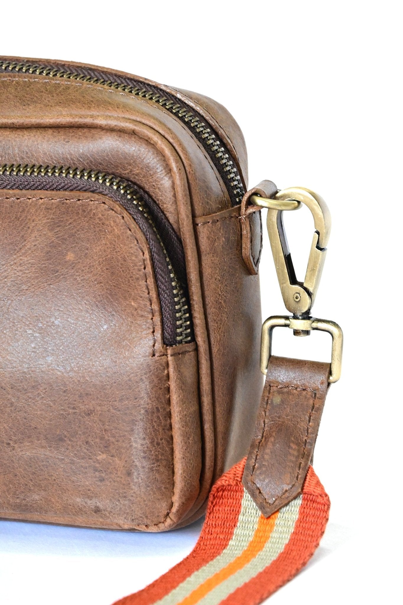 Harisson brown sling bag side view — Art Avenue
