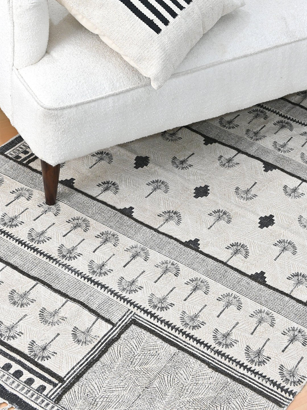 Block-printed cotton dhurrie rug in room setting — Art Avenue