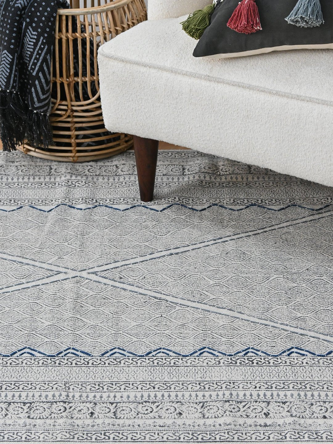 Block-printed cotton dhurrie rug in room setting — Art Avenue