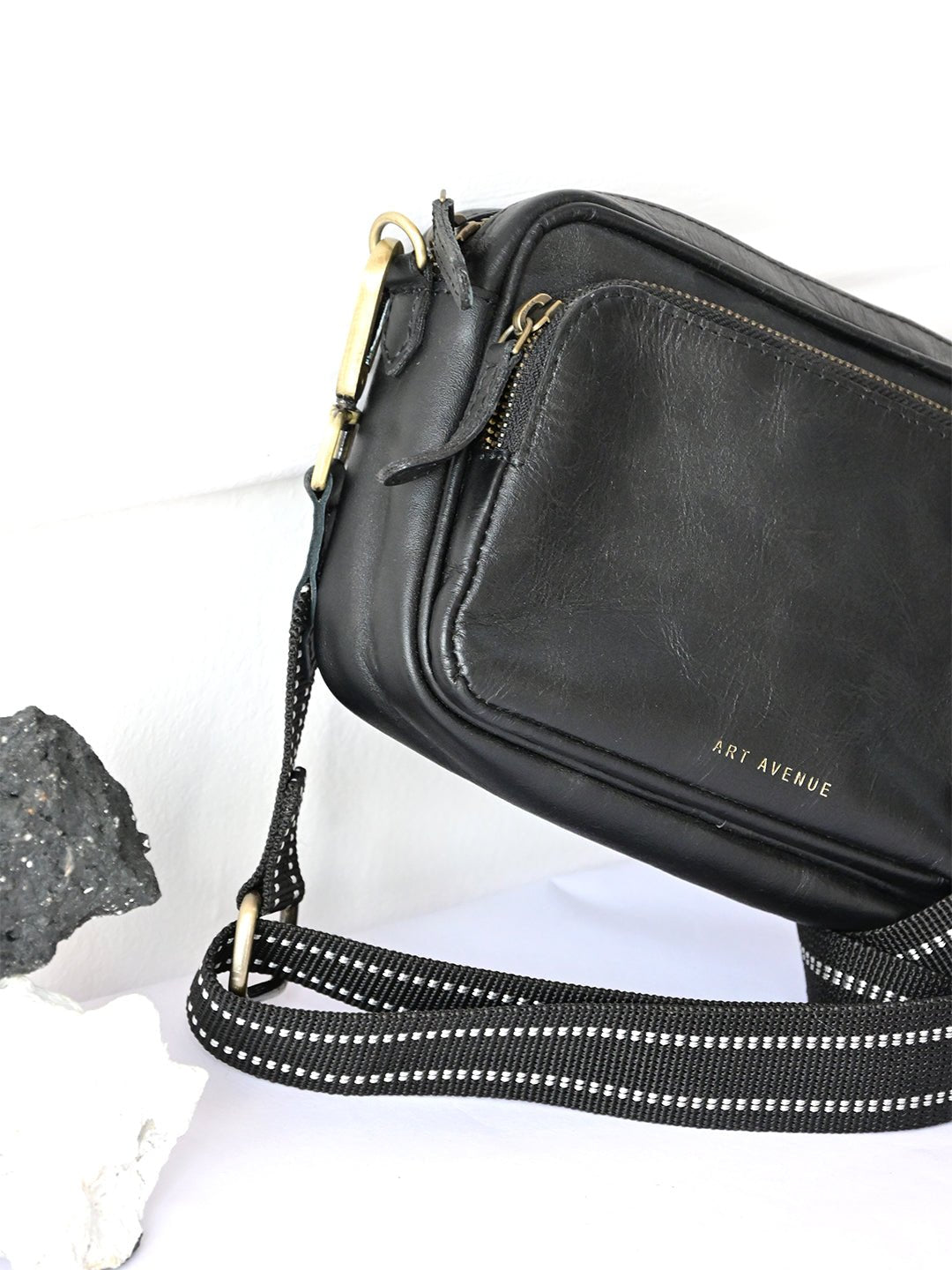 Harisson leather sling bag in black, second view — Art Avenue