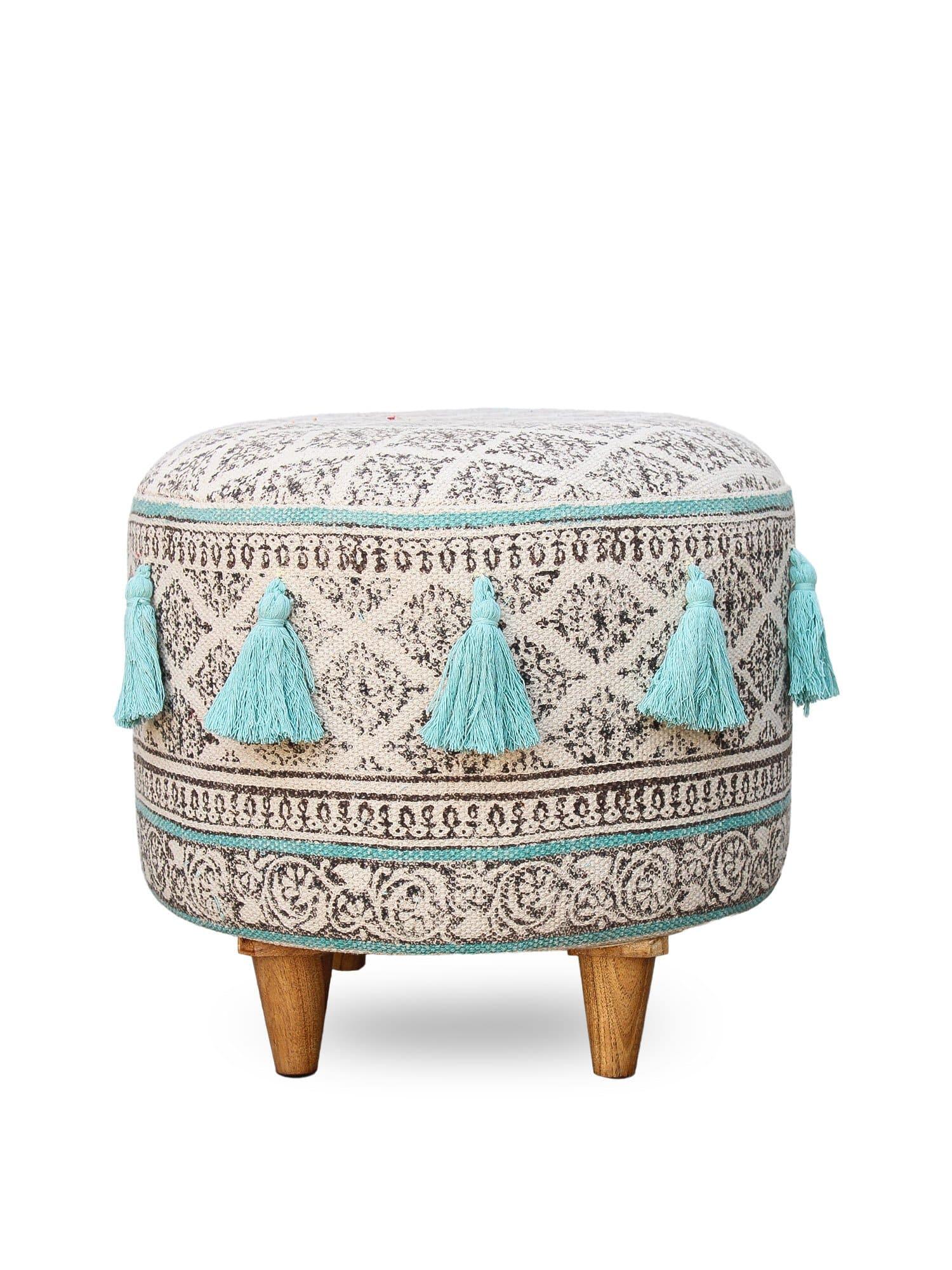 Side view of kilim cylindrical ottoman in aqua — Art Avenue
