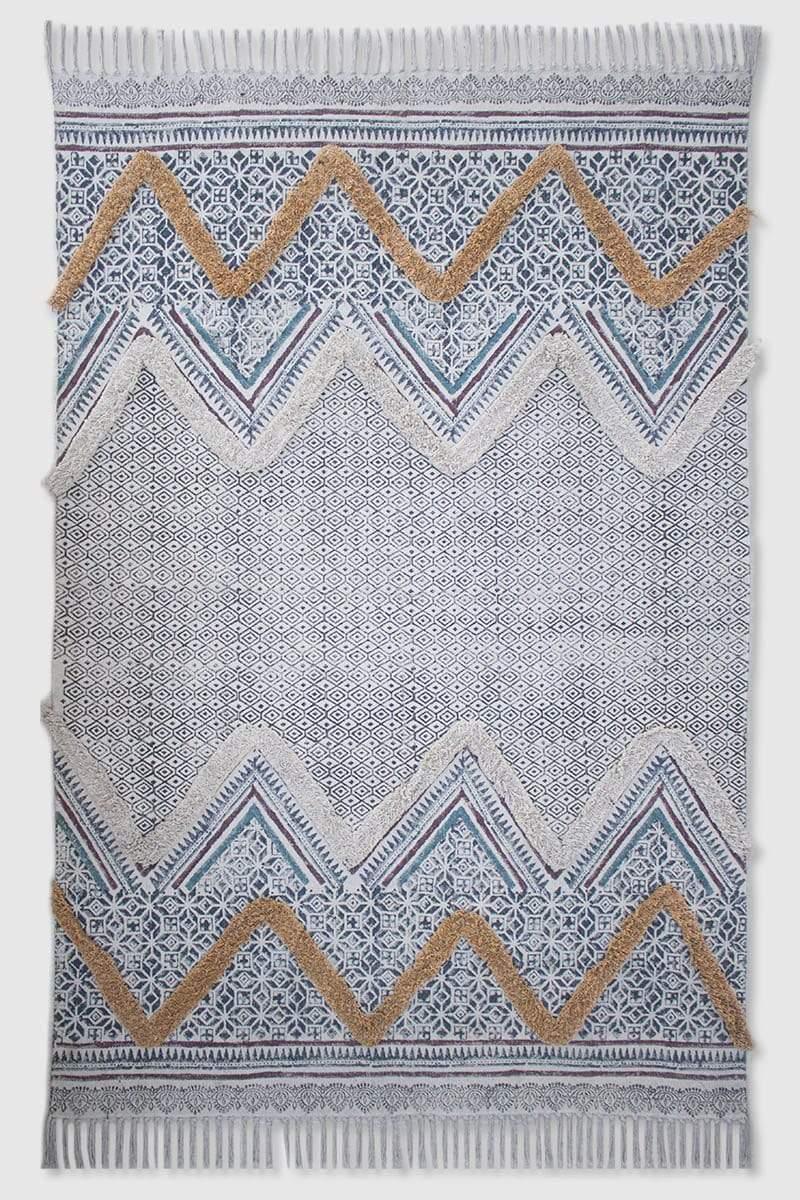 Block-printed cotton dhurrie rug styled in modern interior — Art Avenue