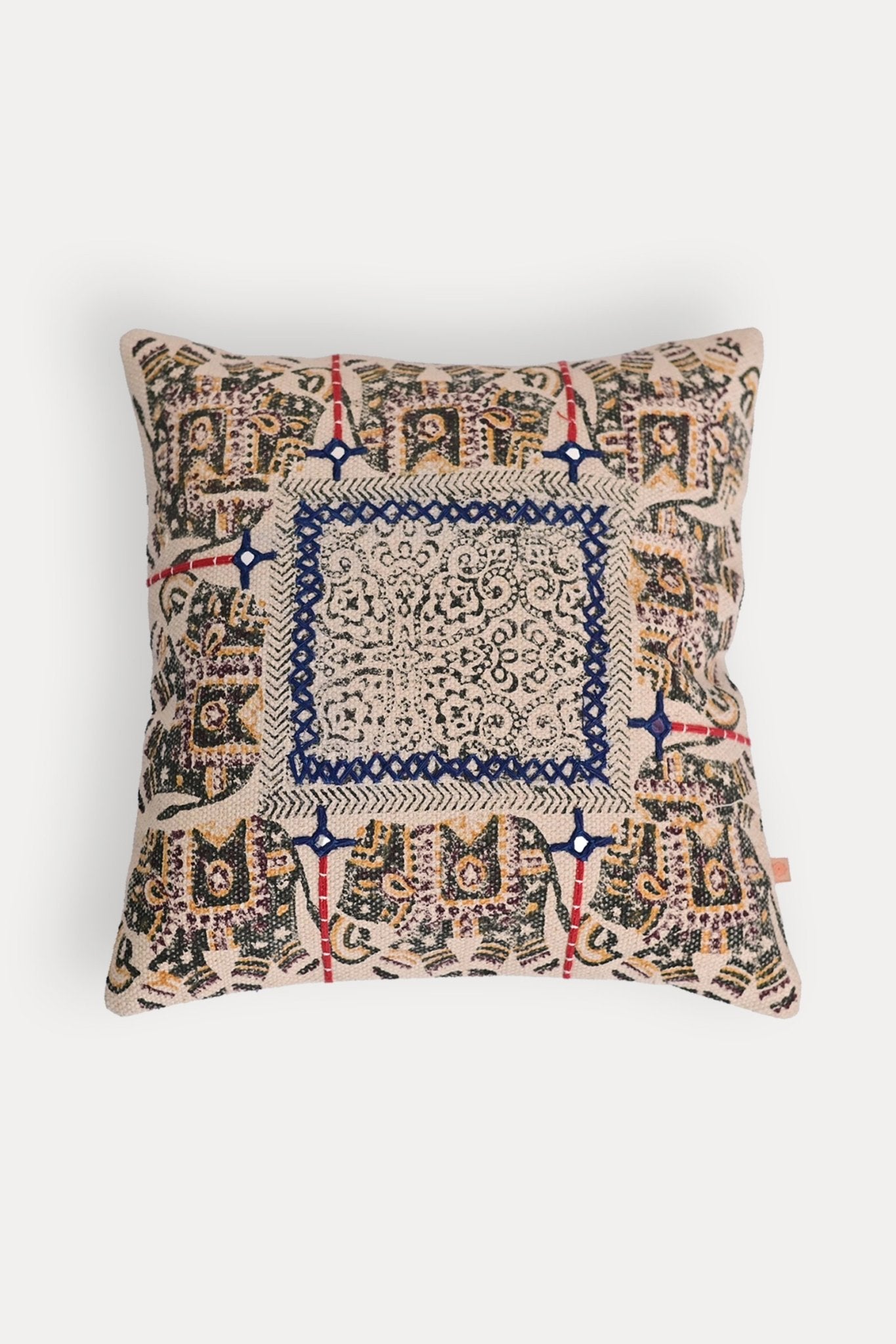 Block-printed square cushion on sofa — Art Avenue