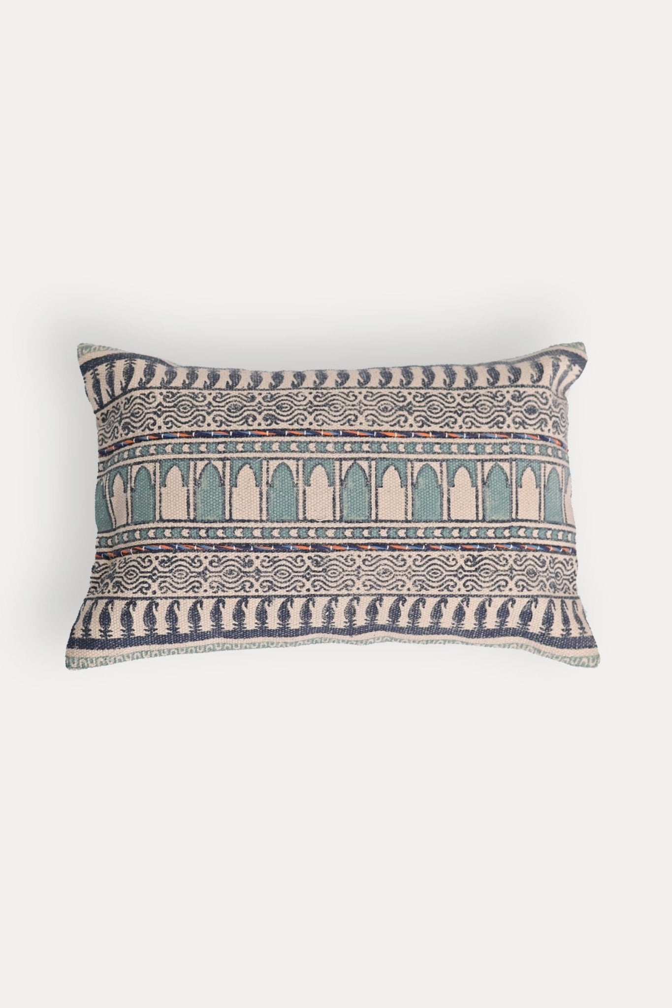 Block-printed embroidered lumbar cushion on sofa — Art Avenue