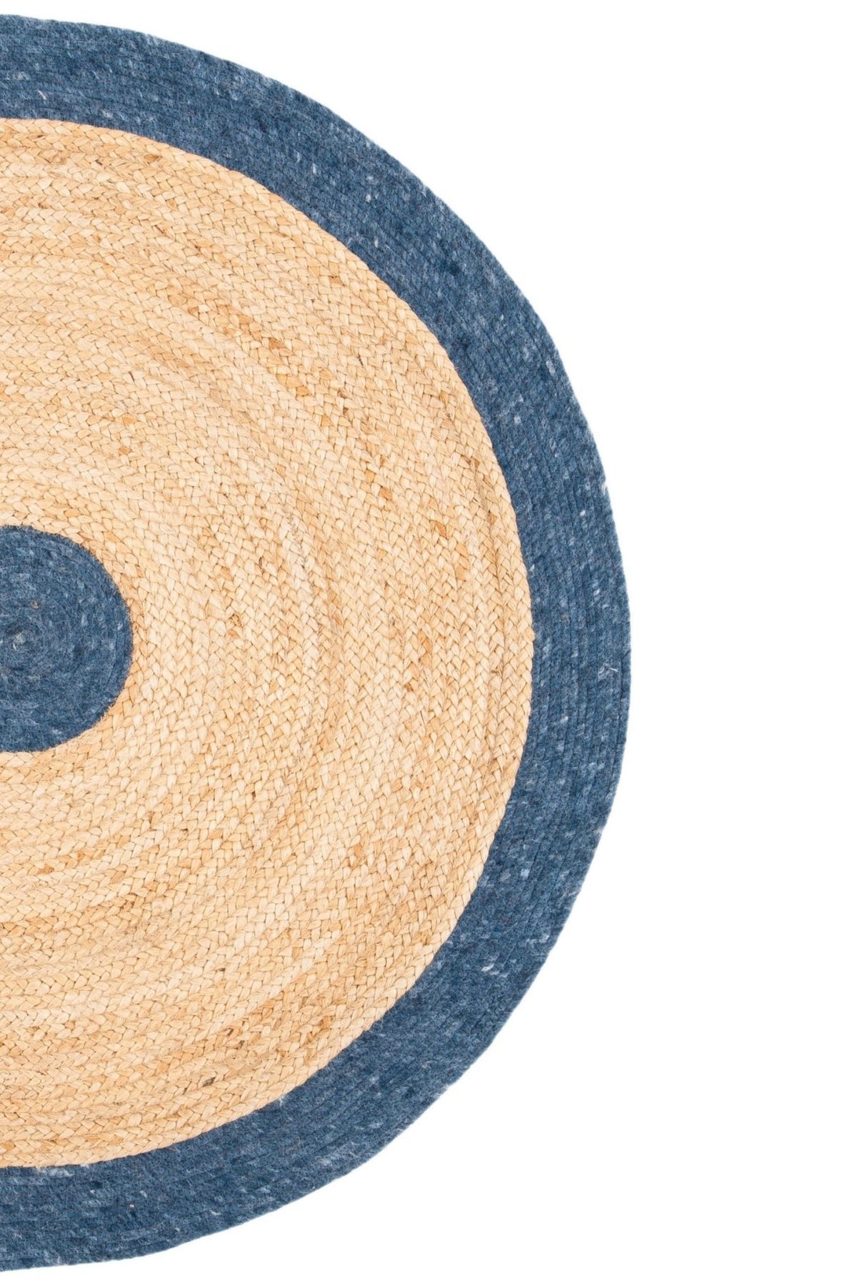 Moist round jute rug room setting — Art Avenue India