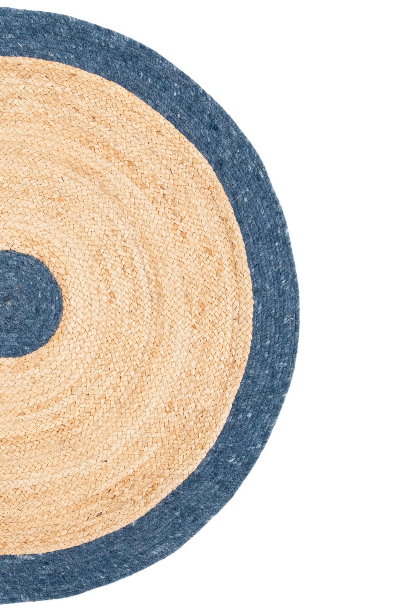Moist round jute rug room setting — Art Avenue India