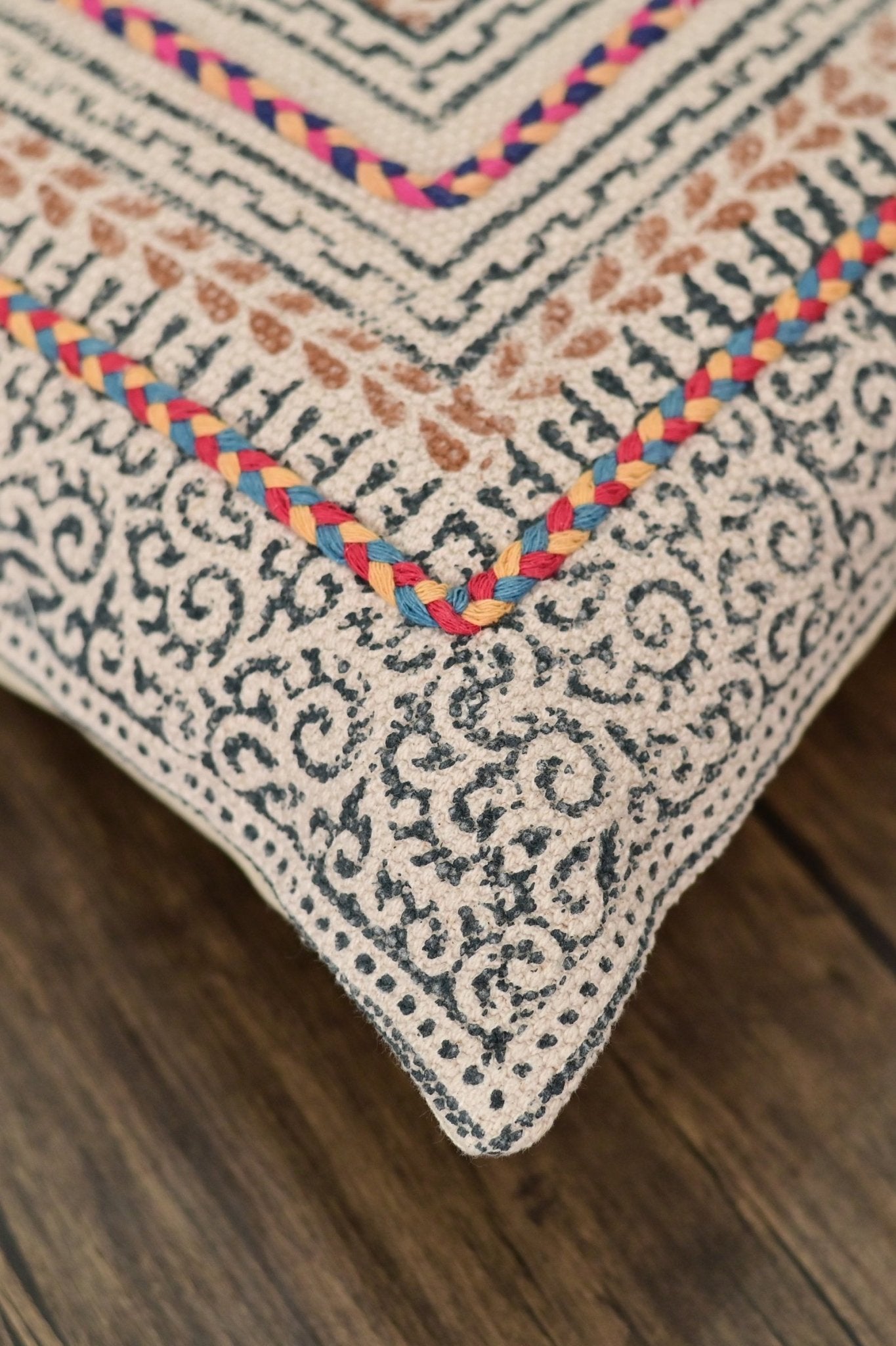 Detail of block-print on orange square cushion cover — Art Avenue