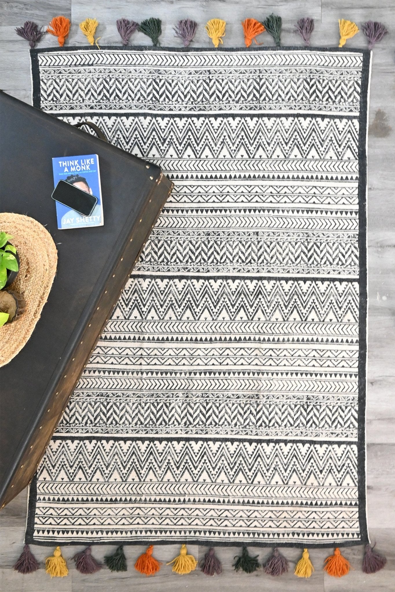Detail of block-print on black dhurrie rug — Art Avenue