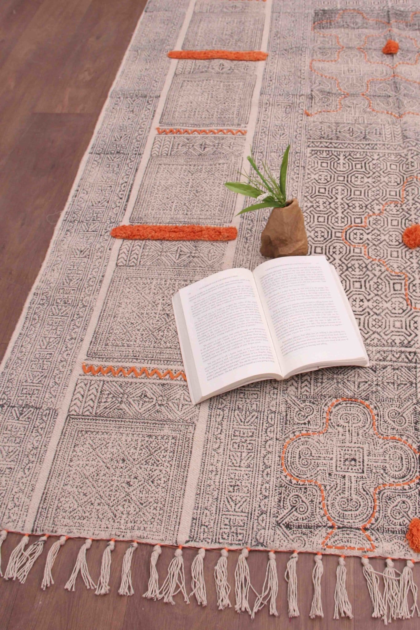 Detail of block-print on dark grey dhurrie rug — Art Avenue