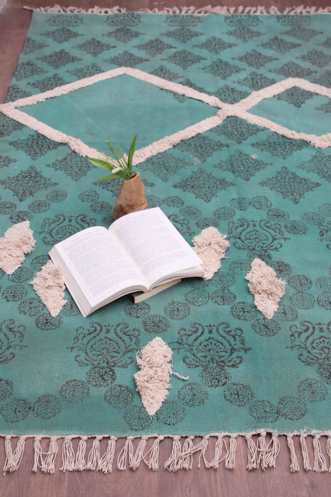 Detail of block-print on turquoise dhurrie rug — Art Avenue