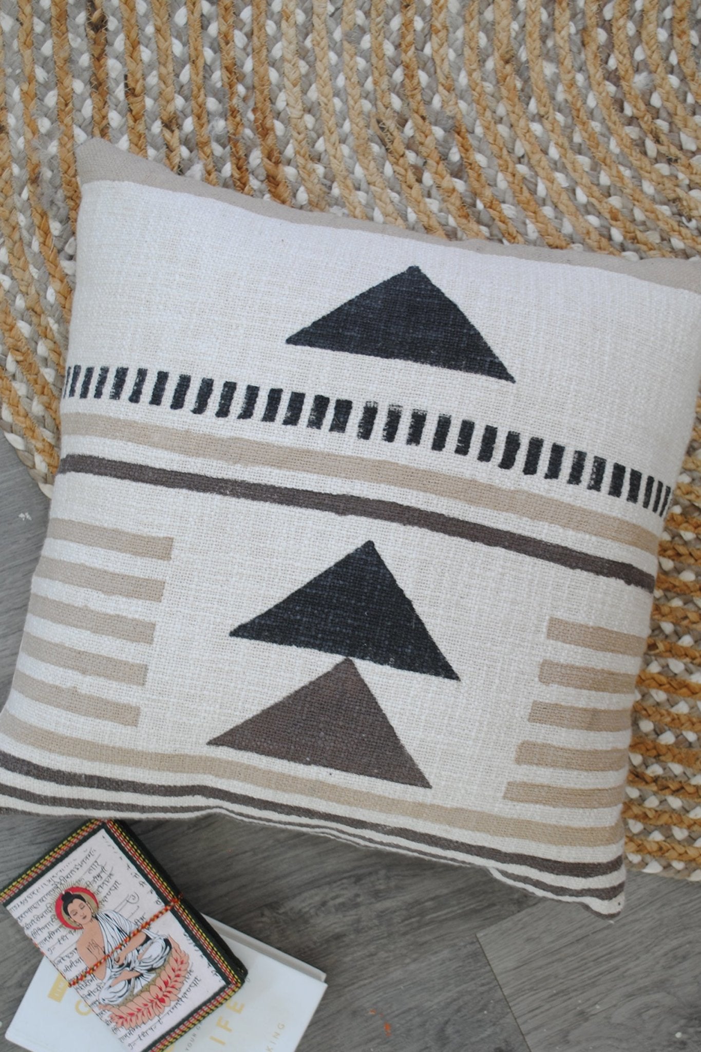 Block-printed square cushion on sofa — Art Avenue