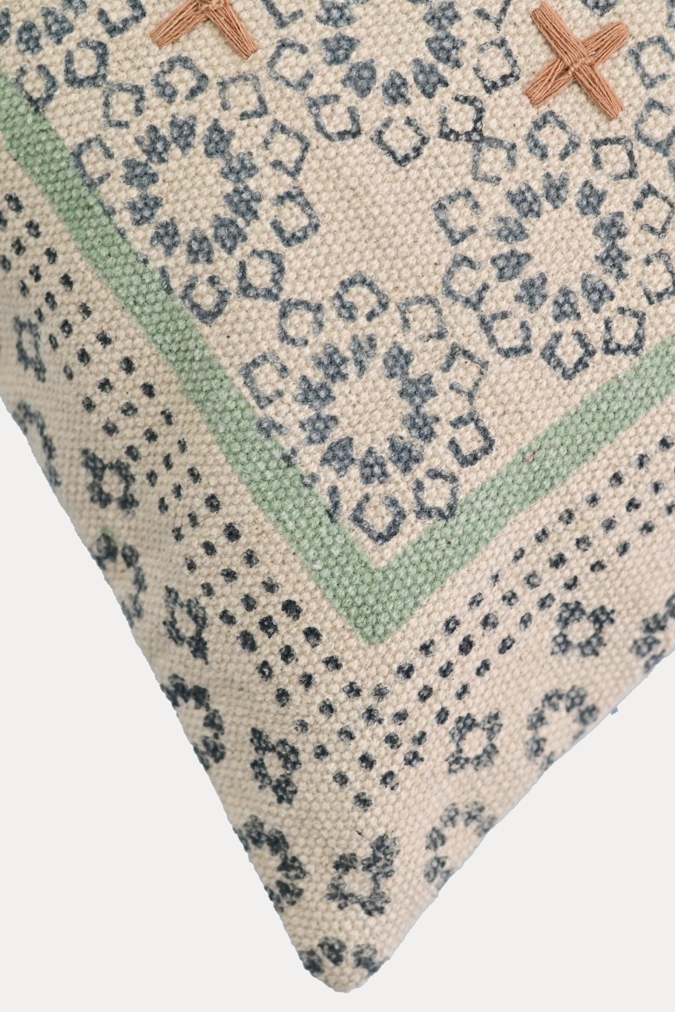 Detail of block-print on green square cushion cover — Art Avenue