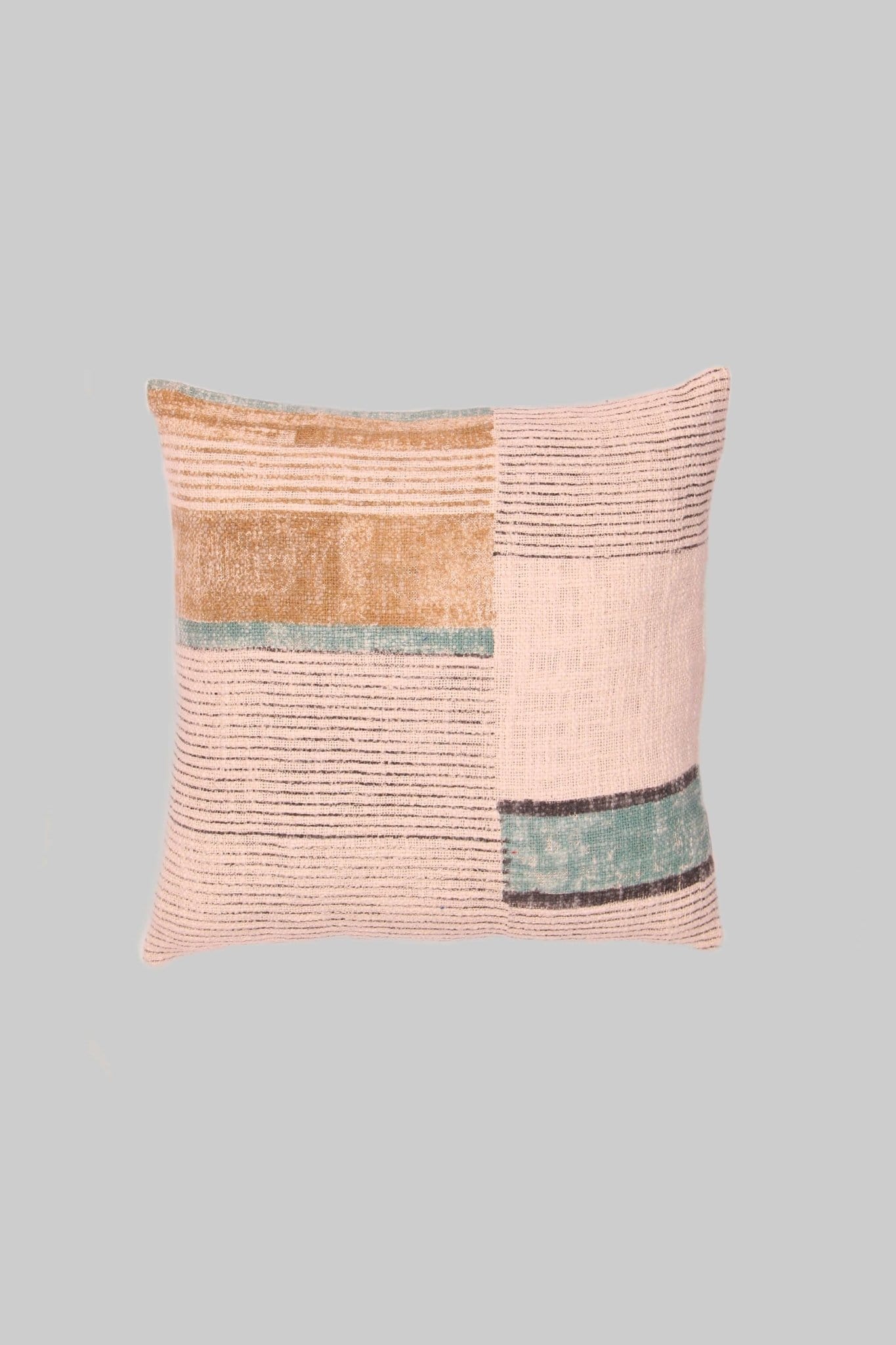 Block-printed square cushion on sofa — Art Avenue