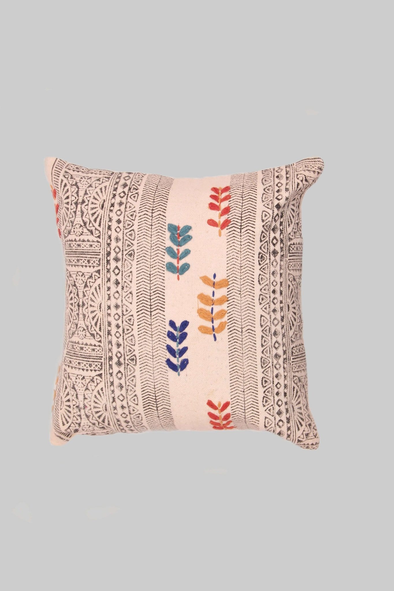 Block-printed square cushion on sofa — Art Avenue