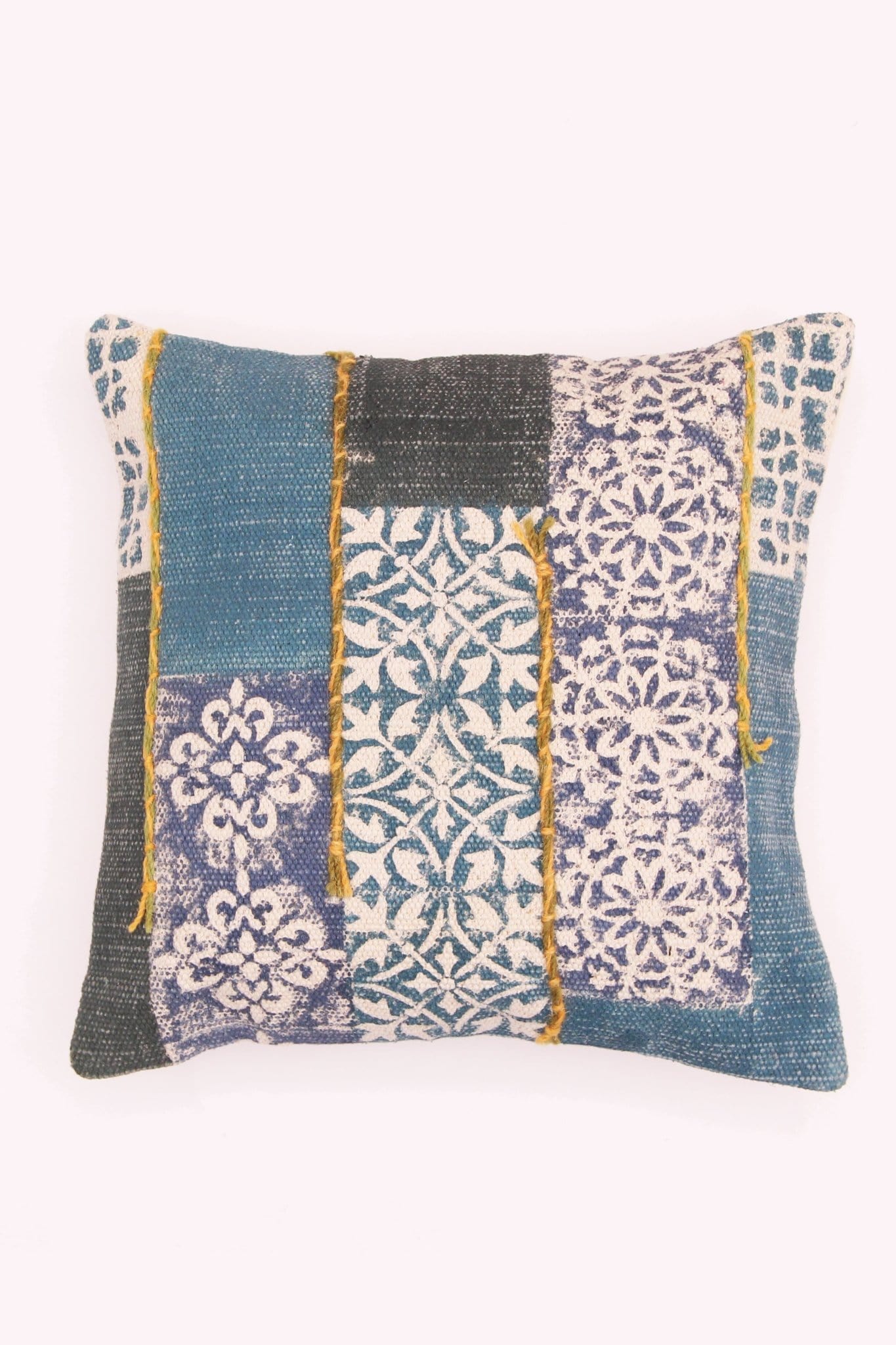 Block-printed square cushion on sofa — Art Avenue