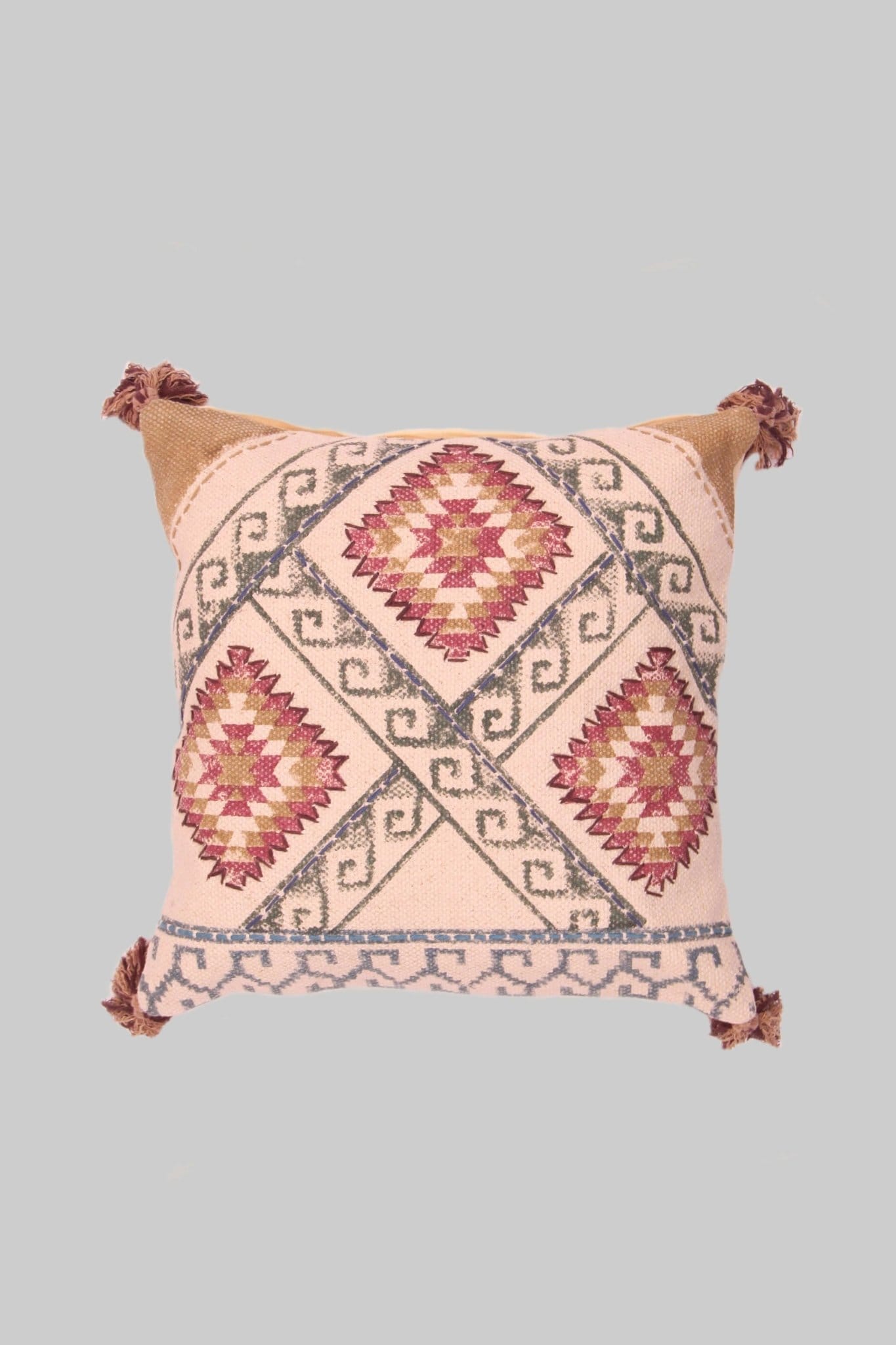 Block-printed square cushion on sofa — Art Avenue
