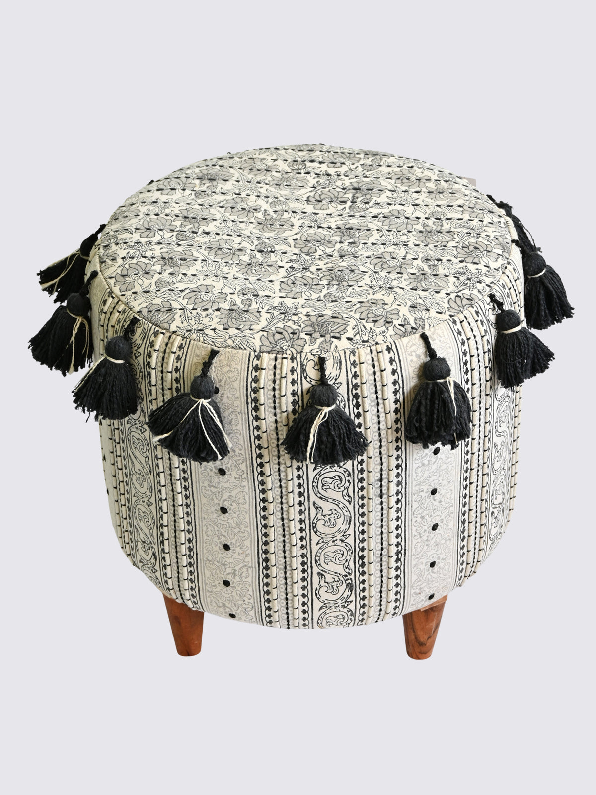 Side view of kilim cylindrical ottoman in brown — Art Avenue