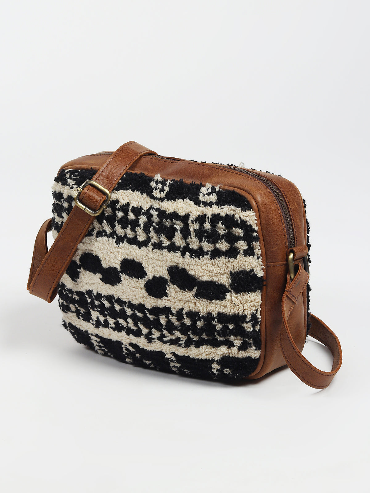 Archer leather sling bag front detail — Art Avenue