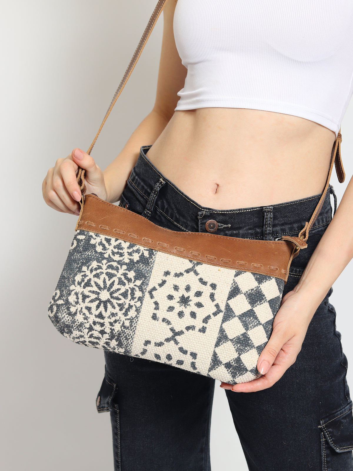 Charlotte sling bag flat lay — Art Avenue