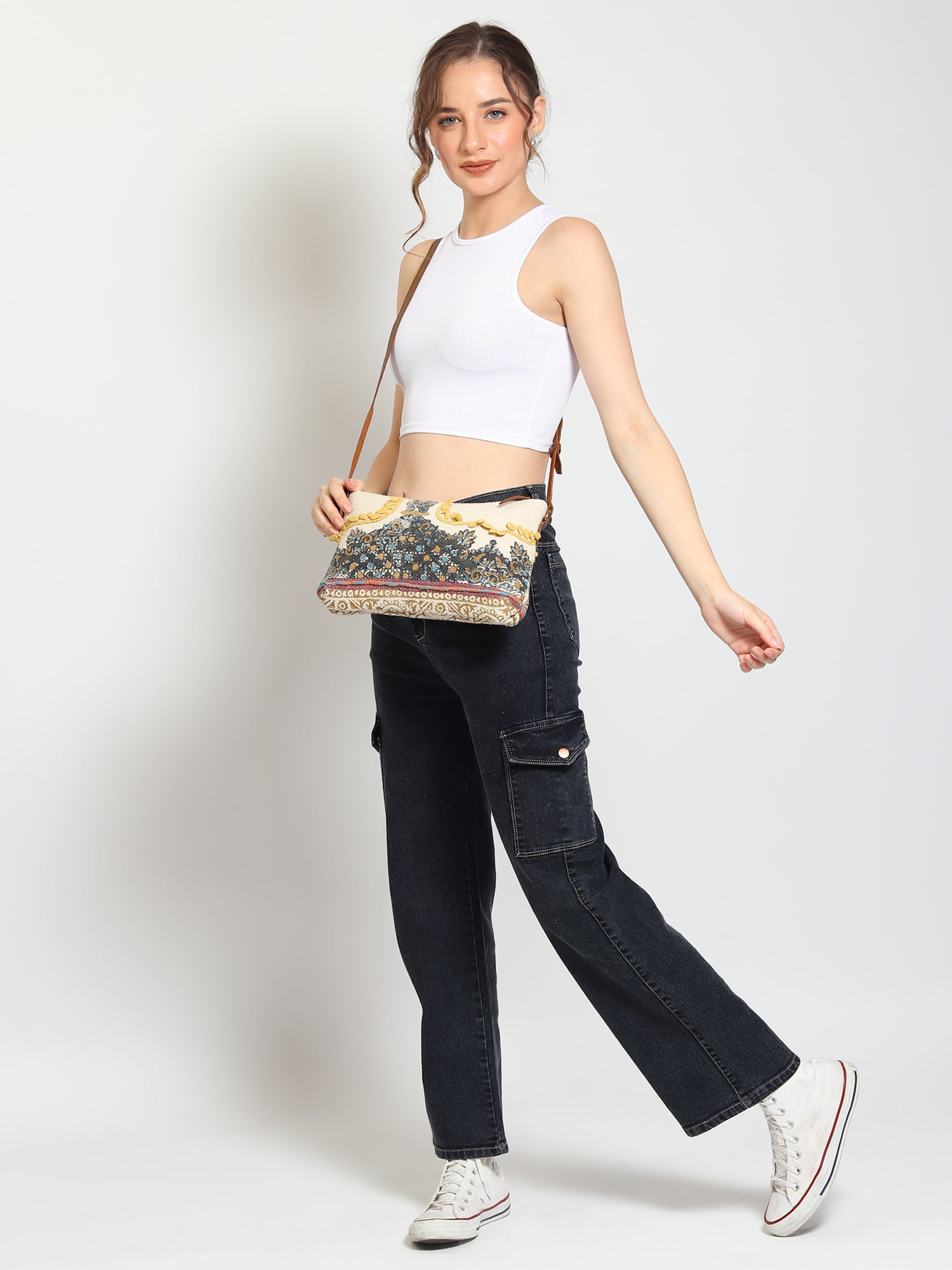 Danian sling bag flat lay — Art Avenue