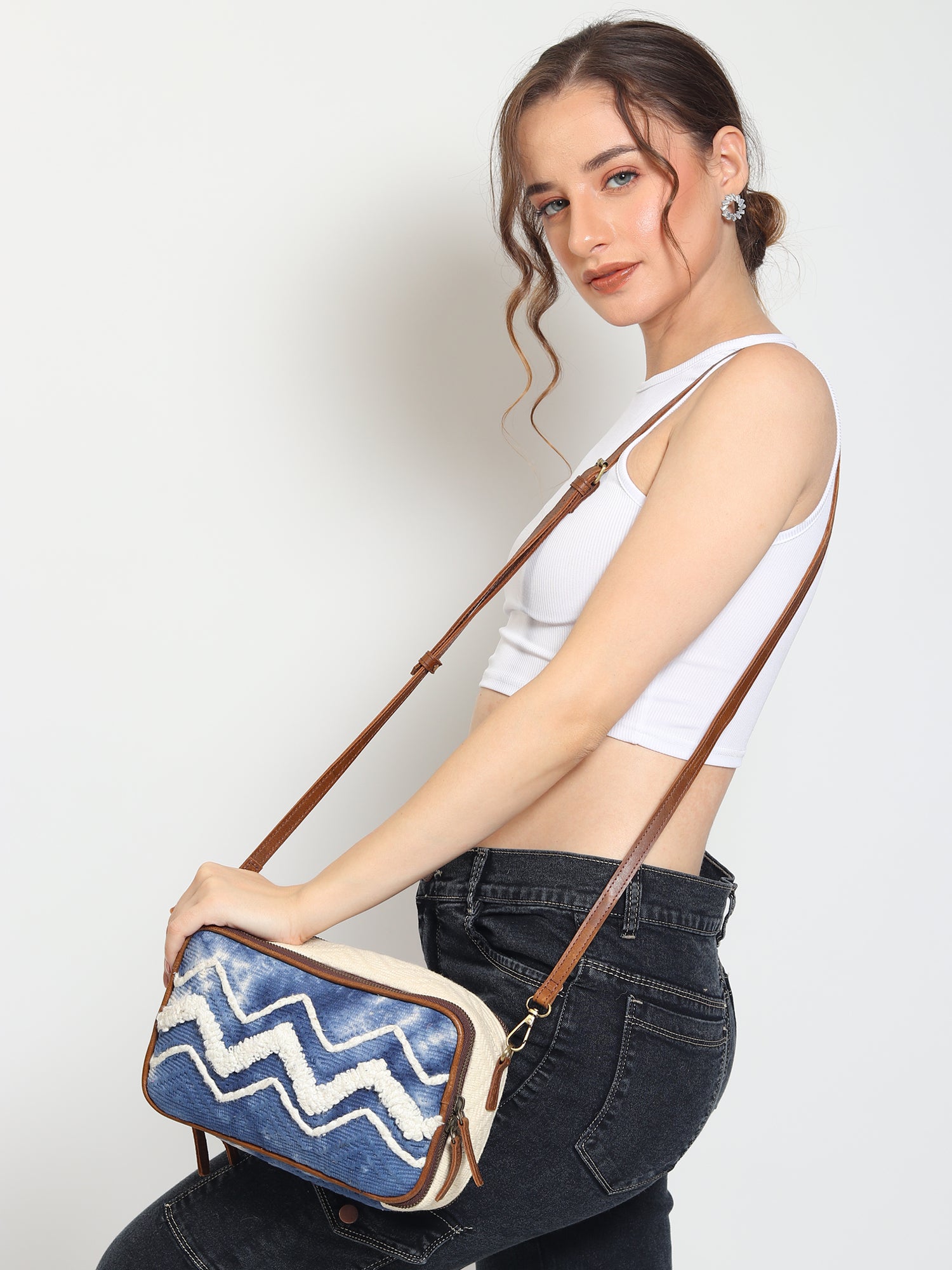 Luigina cotton and leather sling bag closure detail — Art Avenue