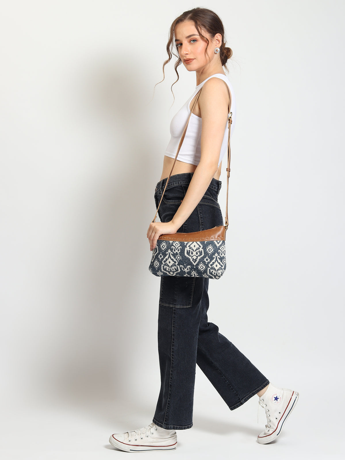 Ava leather and printed fabric sling bag closure detail — Art Avenue