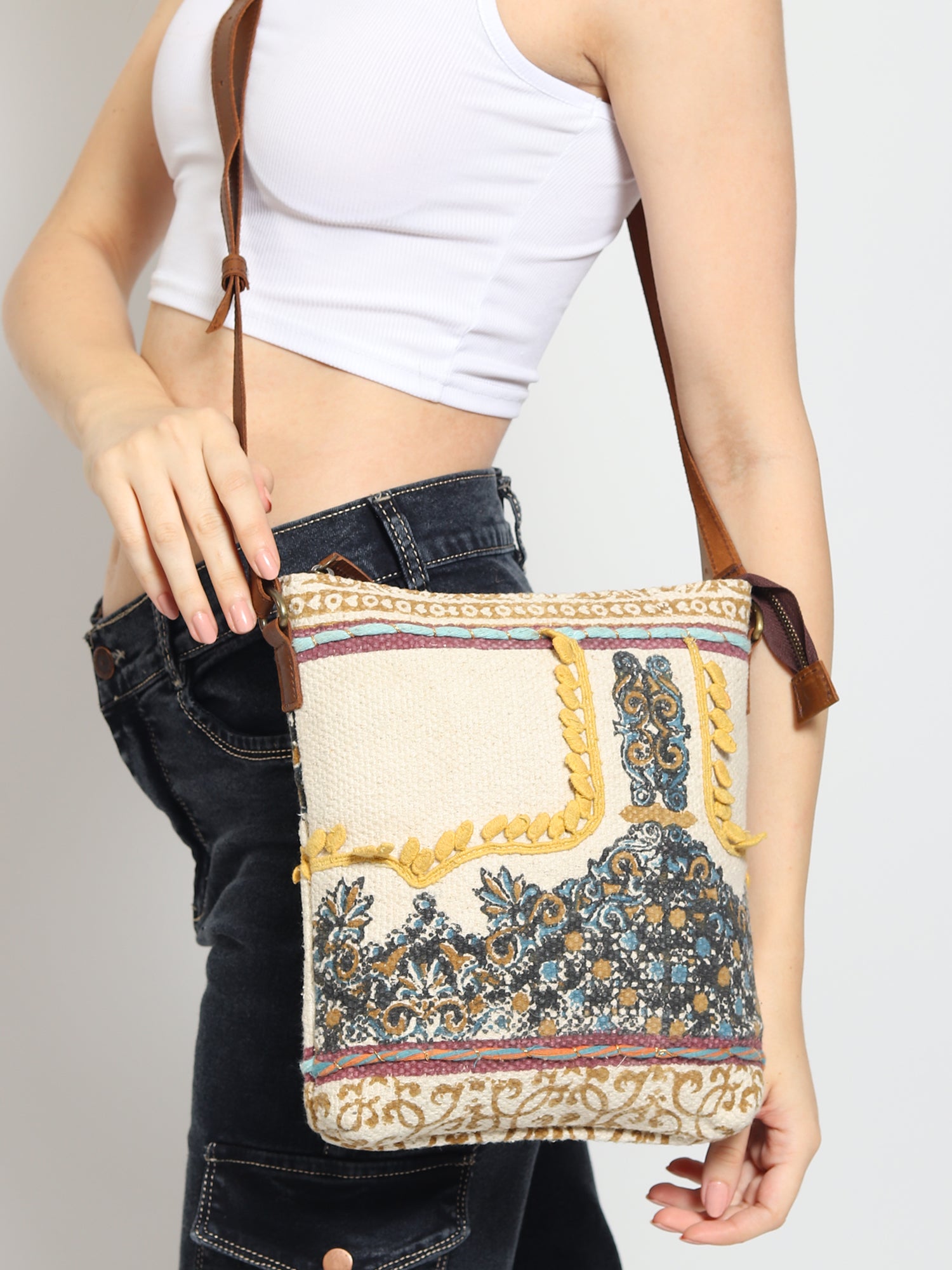 Ifaion block-printed and leather sling bag closure detail — Art Avenue