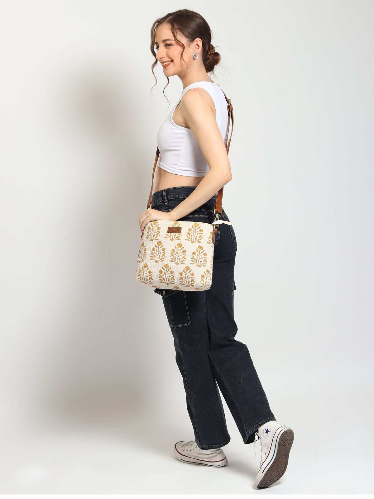 Charlie sling bag flat lay — Art Avenue