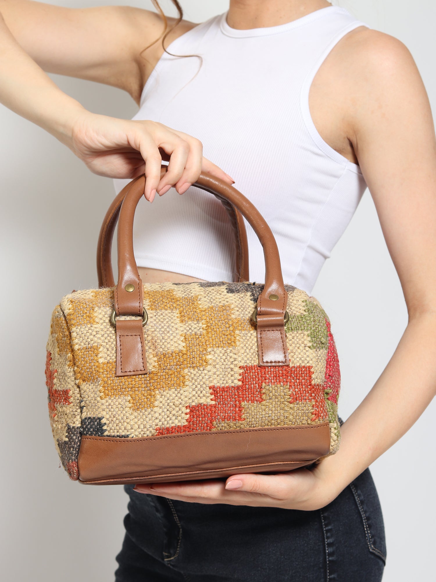 Digilent kilim and leather duffle bag, side view — Art Avenue