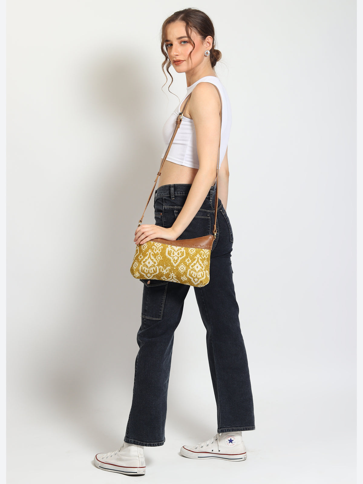 Ayla leather and printed fabric sling bag closure detail — Art Avenue