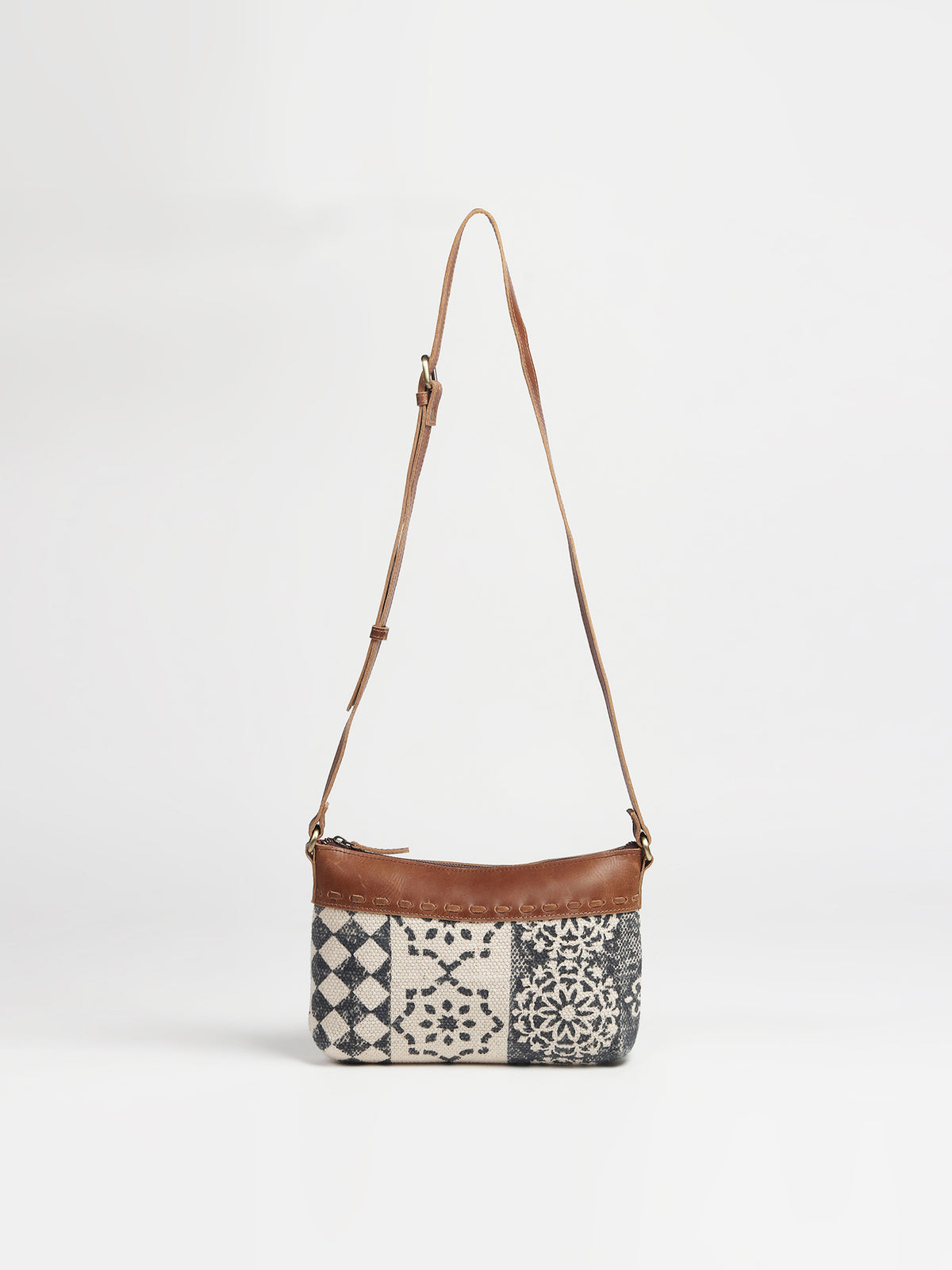 Charlotte leather and printed fabric sling bag — Art Avenue