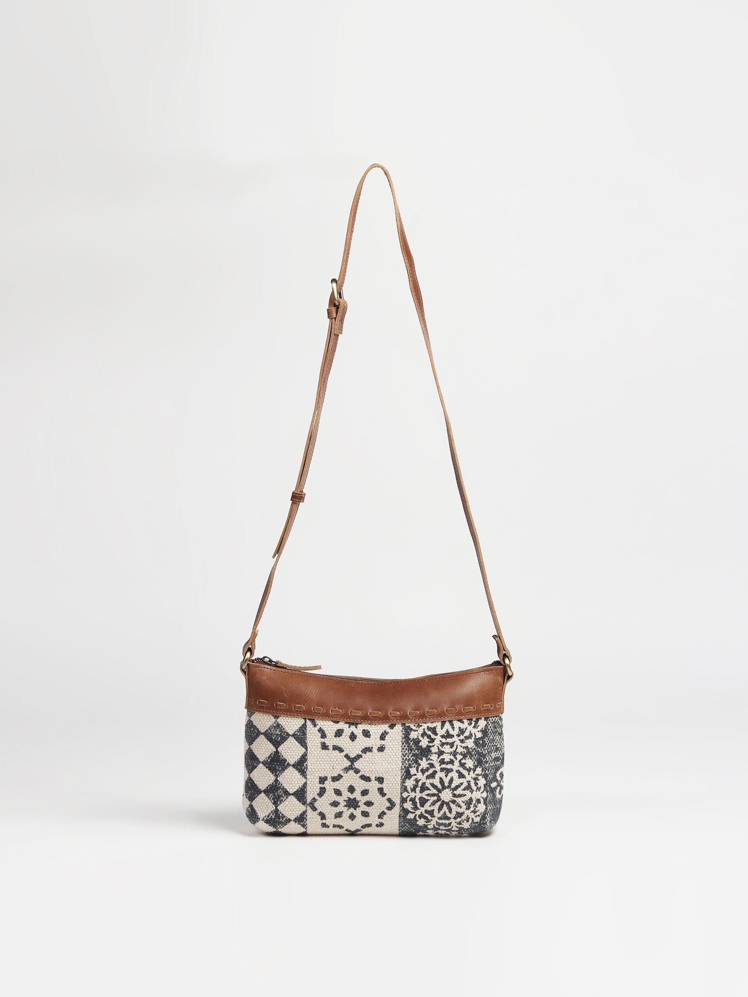 Charlotte leather and printed fabric sling bag — Art Avenue