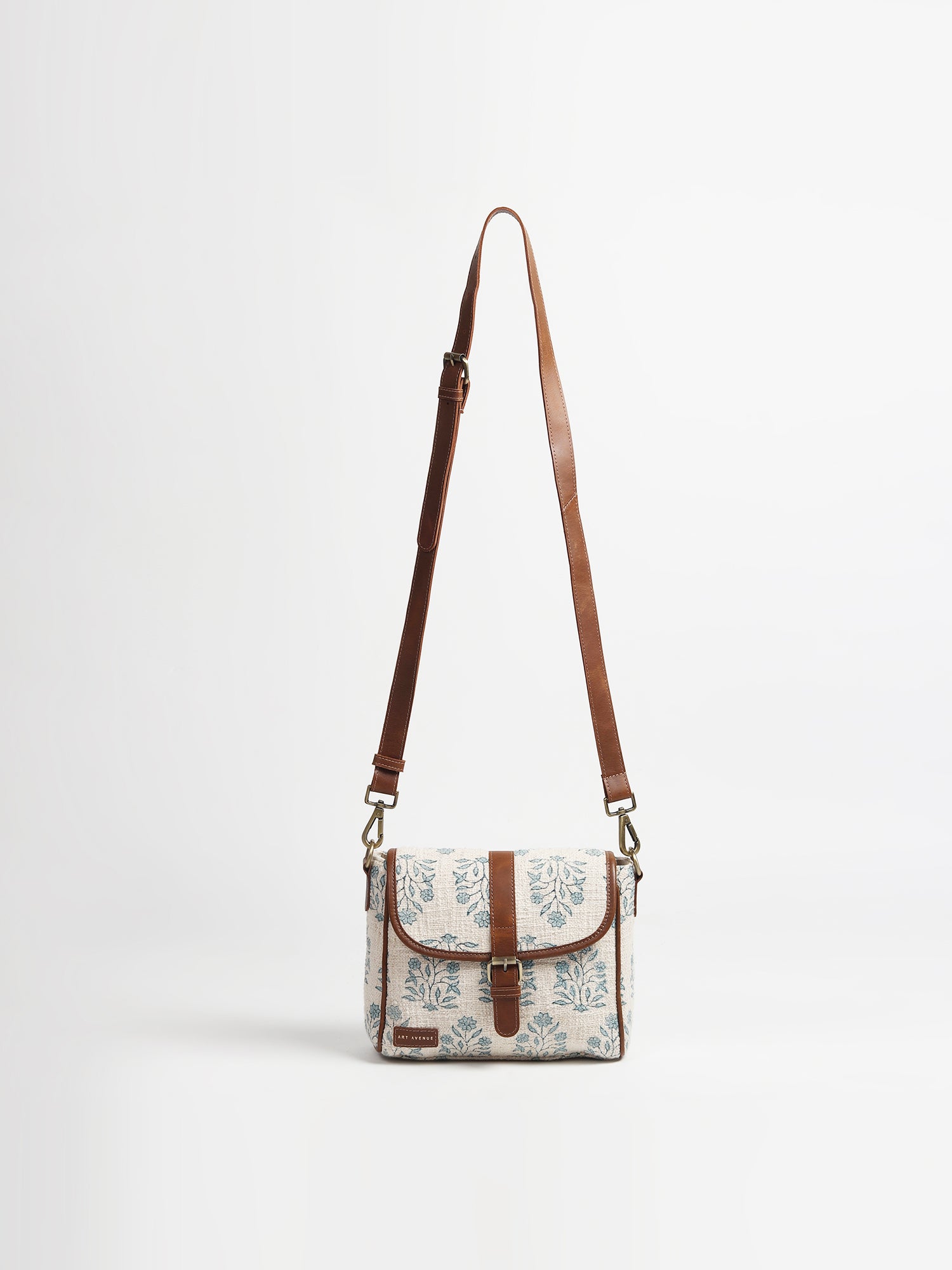 Carter leather sling bag, side view — Art Avenue