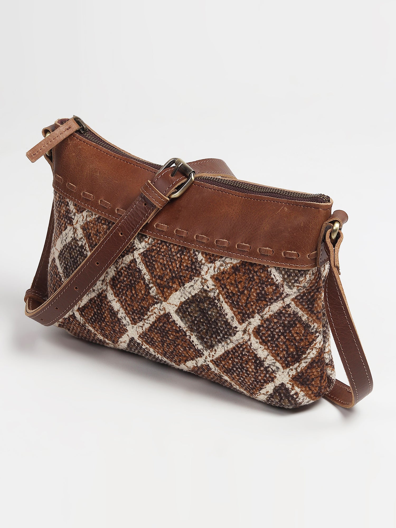 Allambee leather sling bag, side view — Art Avenue