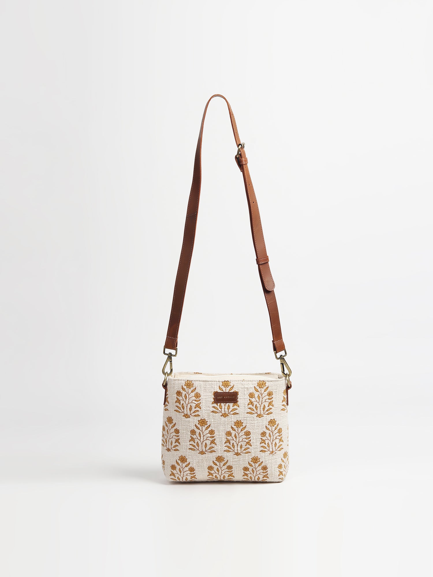 Charlie leather sling bag, side view — Art Avenue