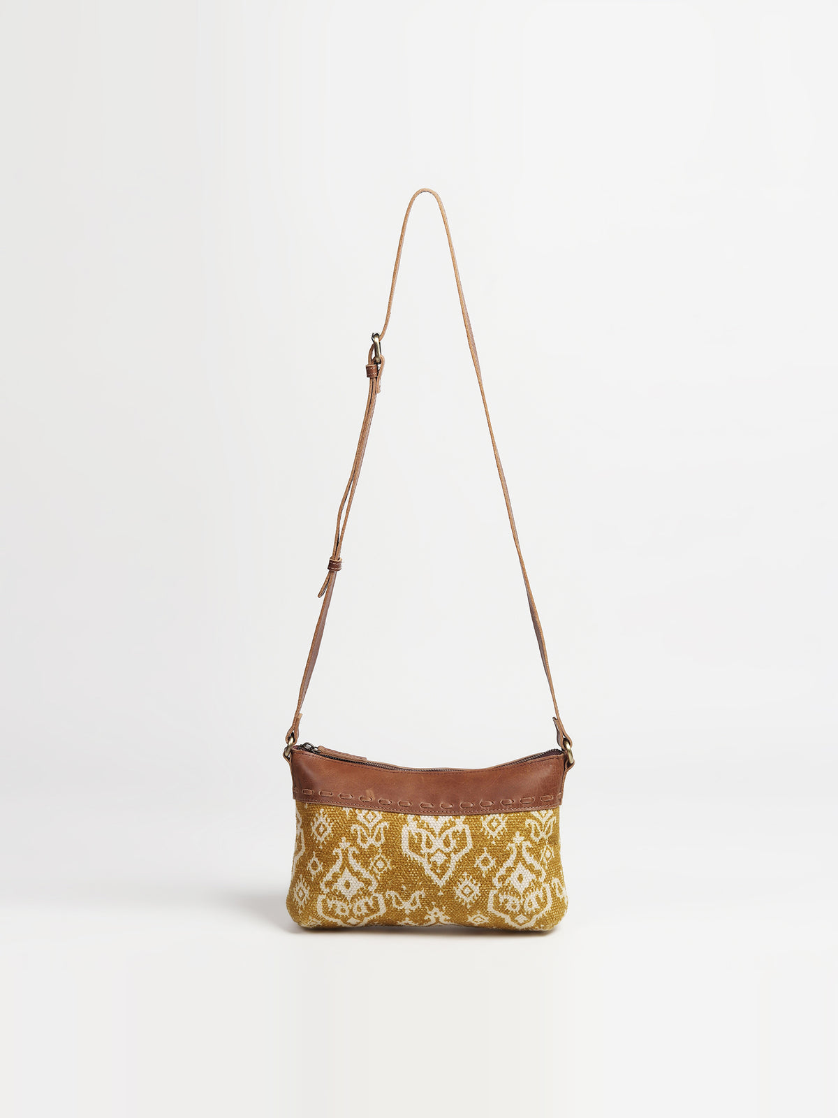 Ayla leather and printed fabric sling bag — Art Avenue