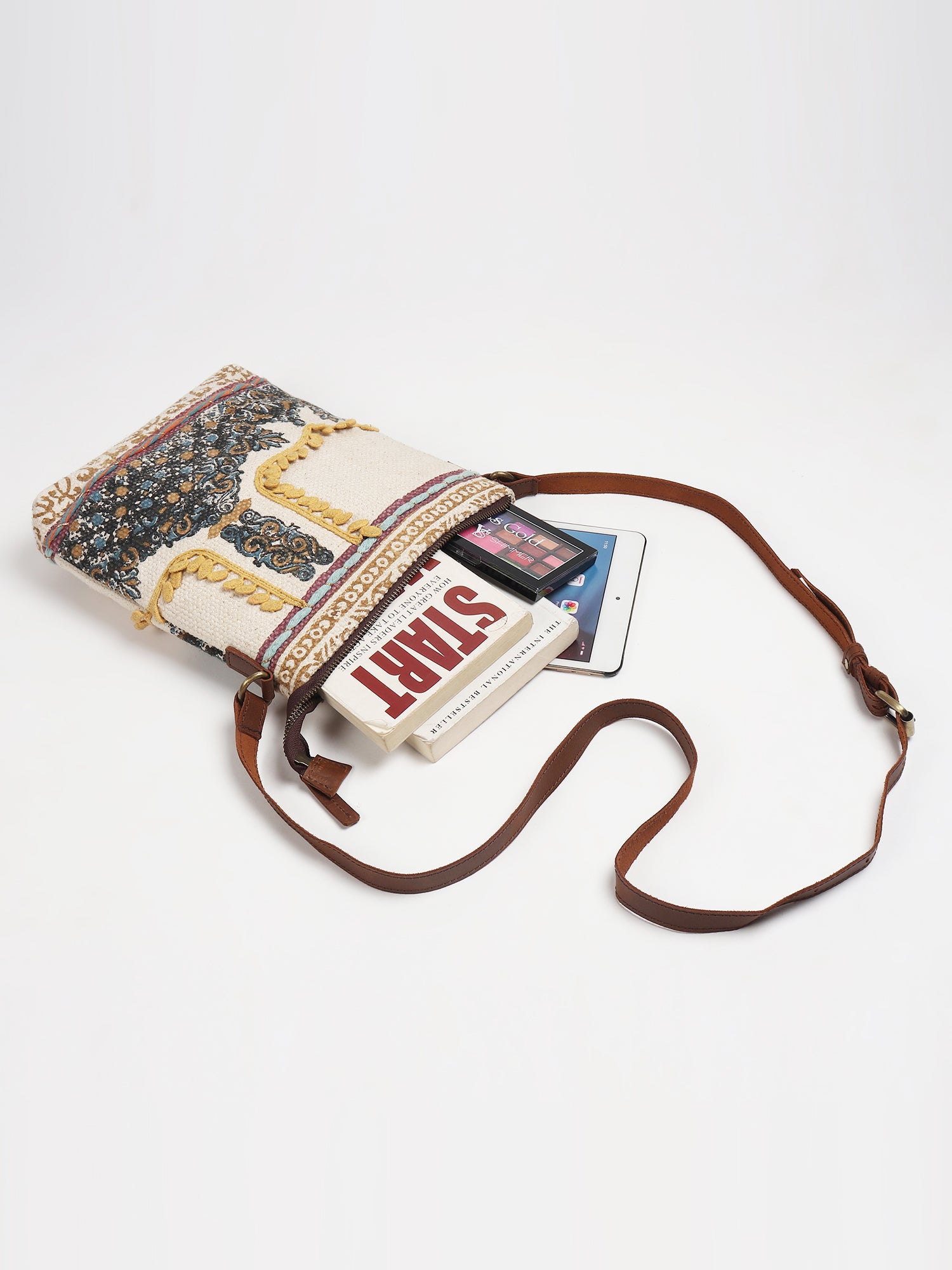 Ifaion leather sling bag on model — Art Avenue
