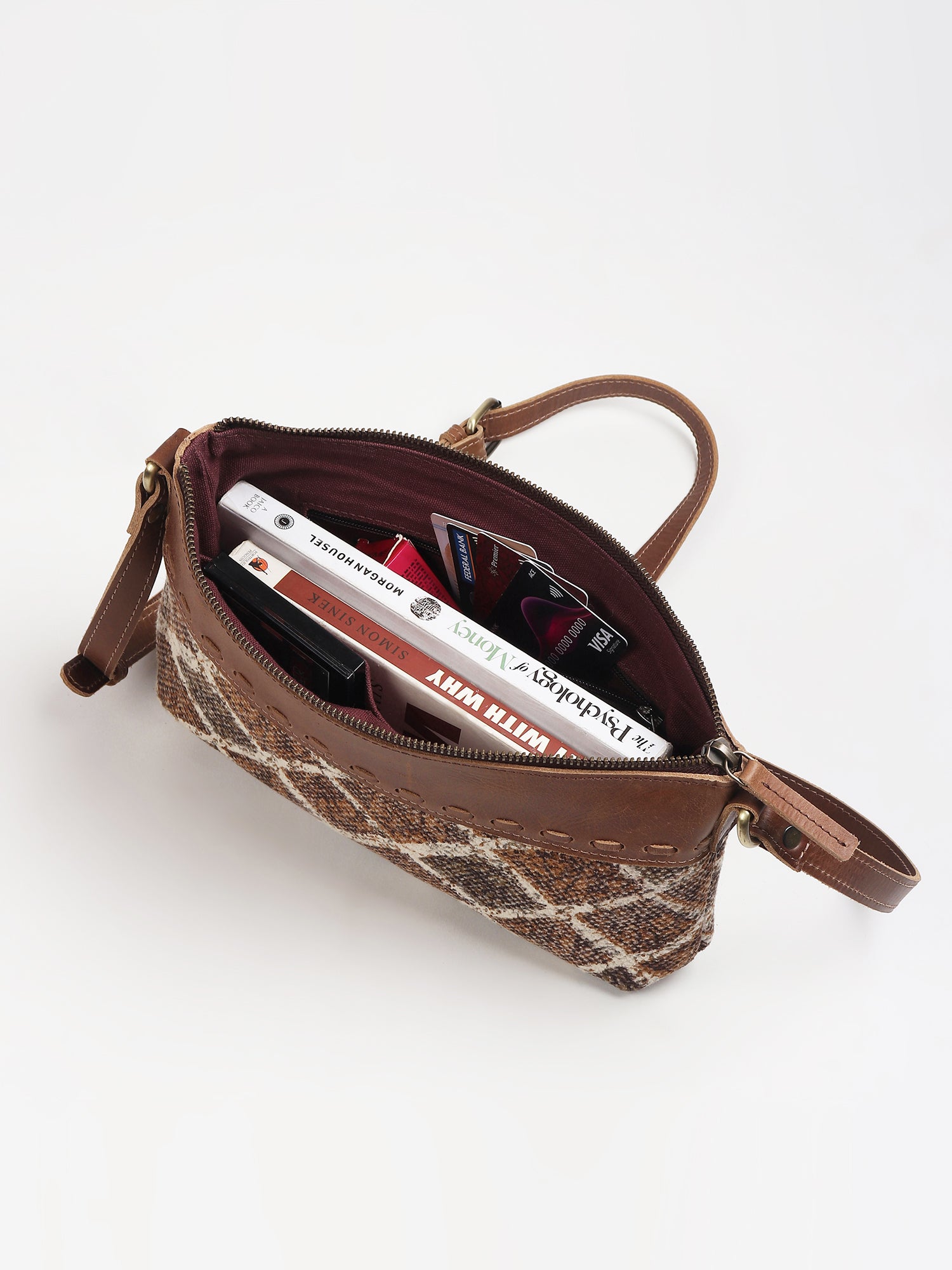 Allambee leather sling bag on model — Art Avenue
