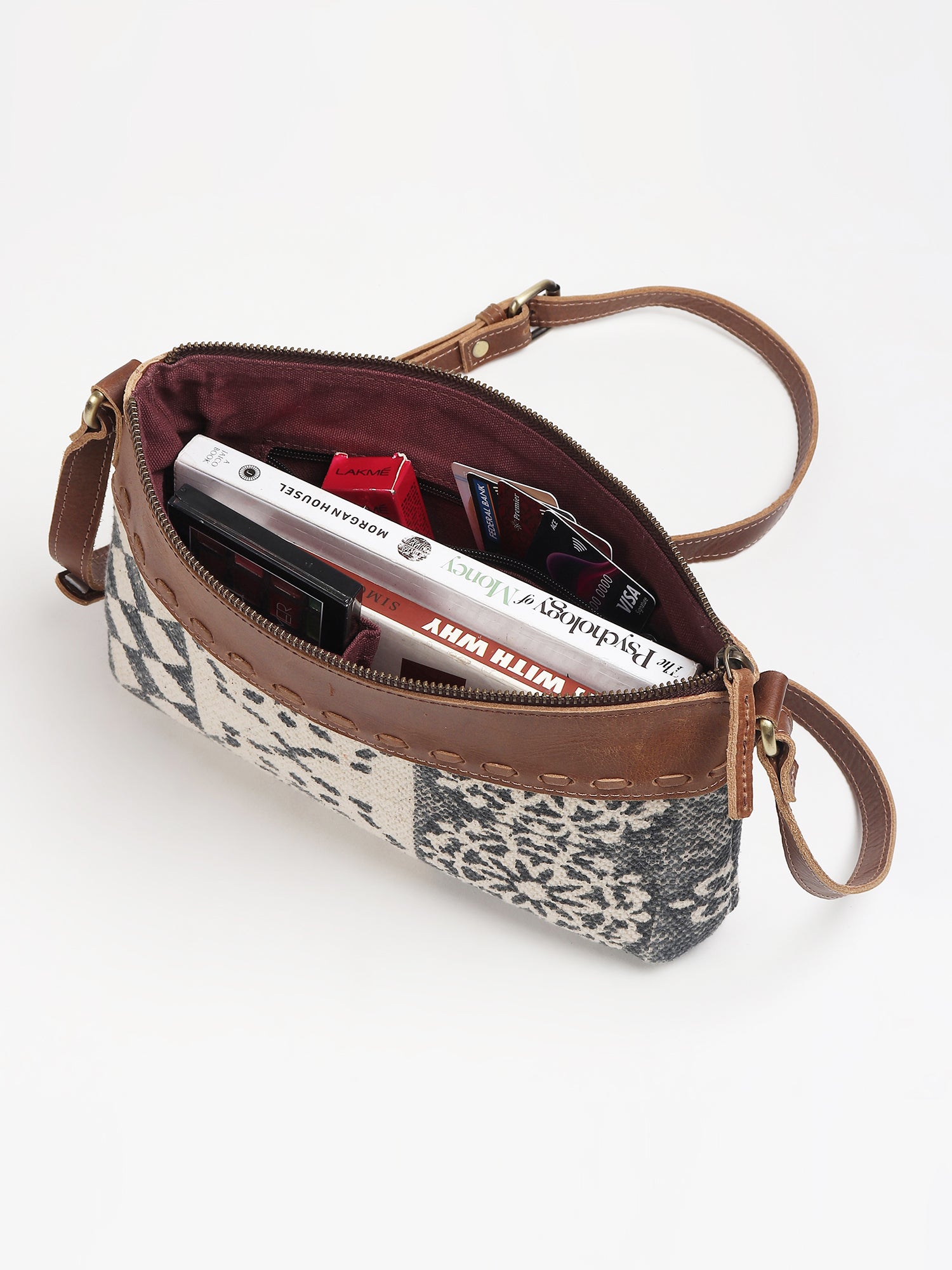 Charlotte leather sling bag on model — Art Avenue